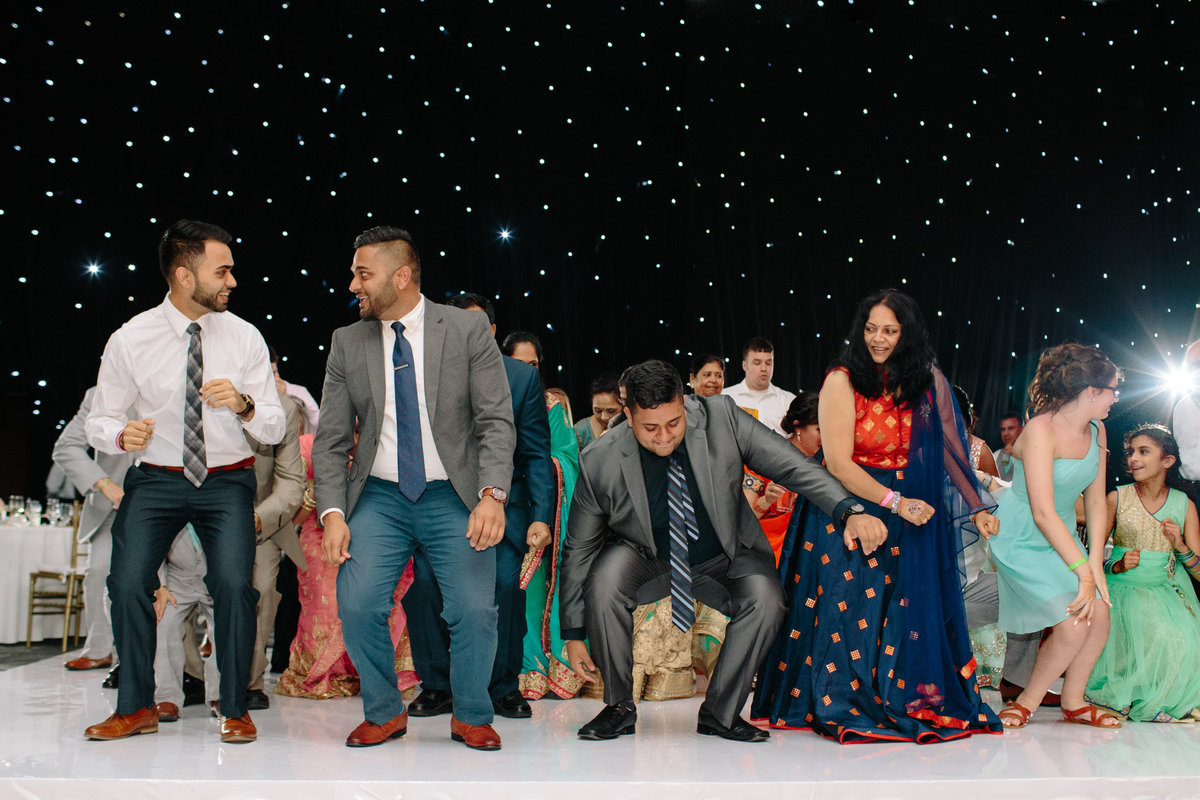 Indian dancing by destination wedding photographer Rebecca Cerasani