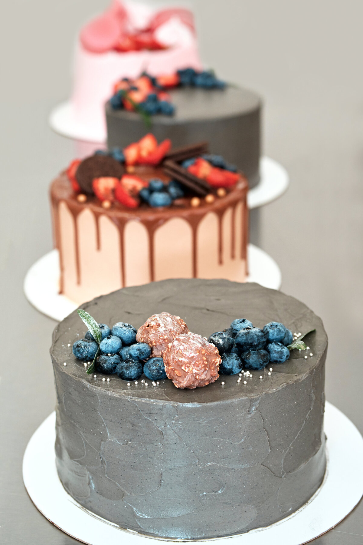 festively-decorated-cakes-on-table-confectionery-2025-03-08-07-46-29-utc