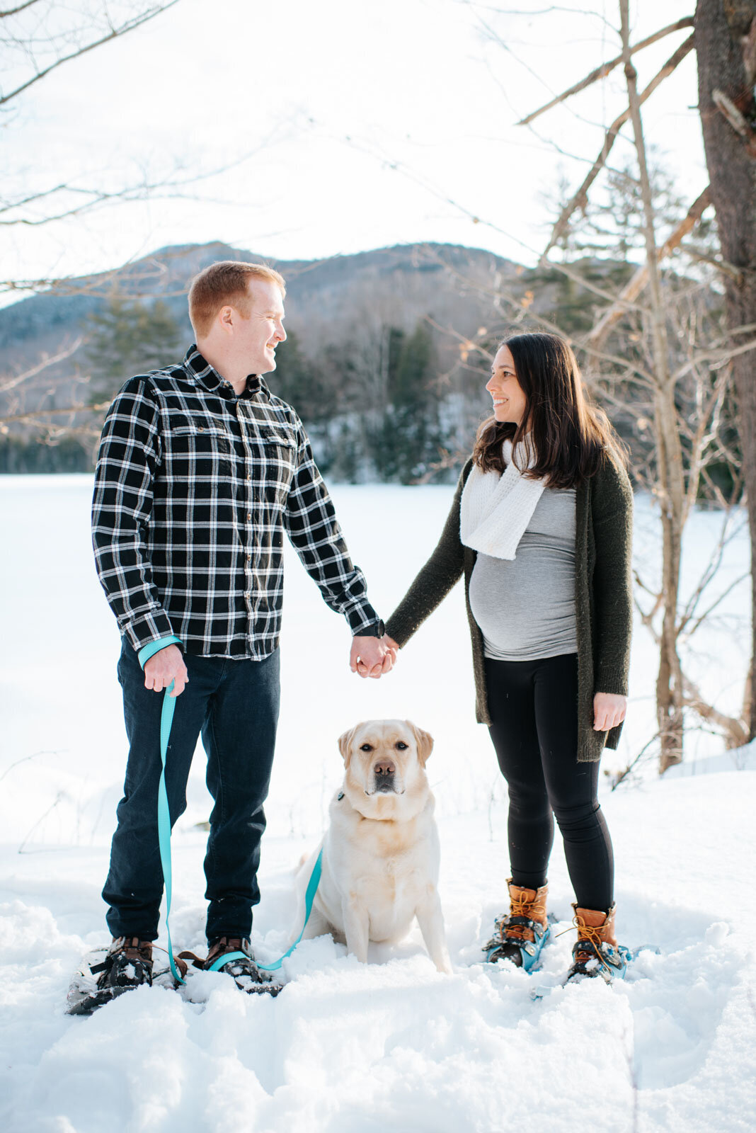pregnant couple dog on snowshoes chittenden vermont