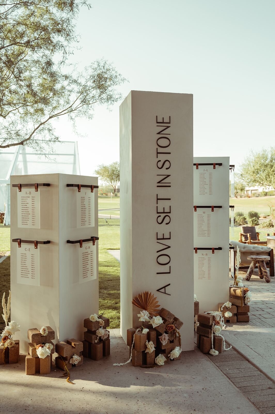 modern_wedding_desert_seating_chart_display_brutalist