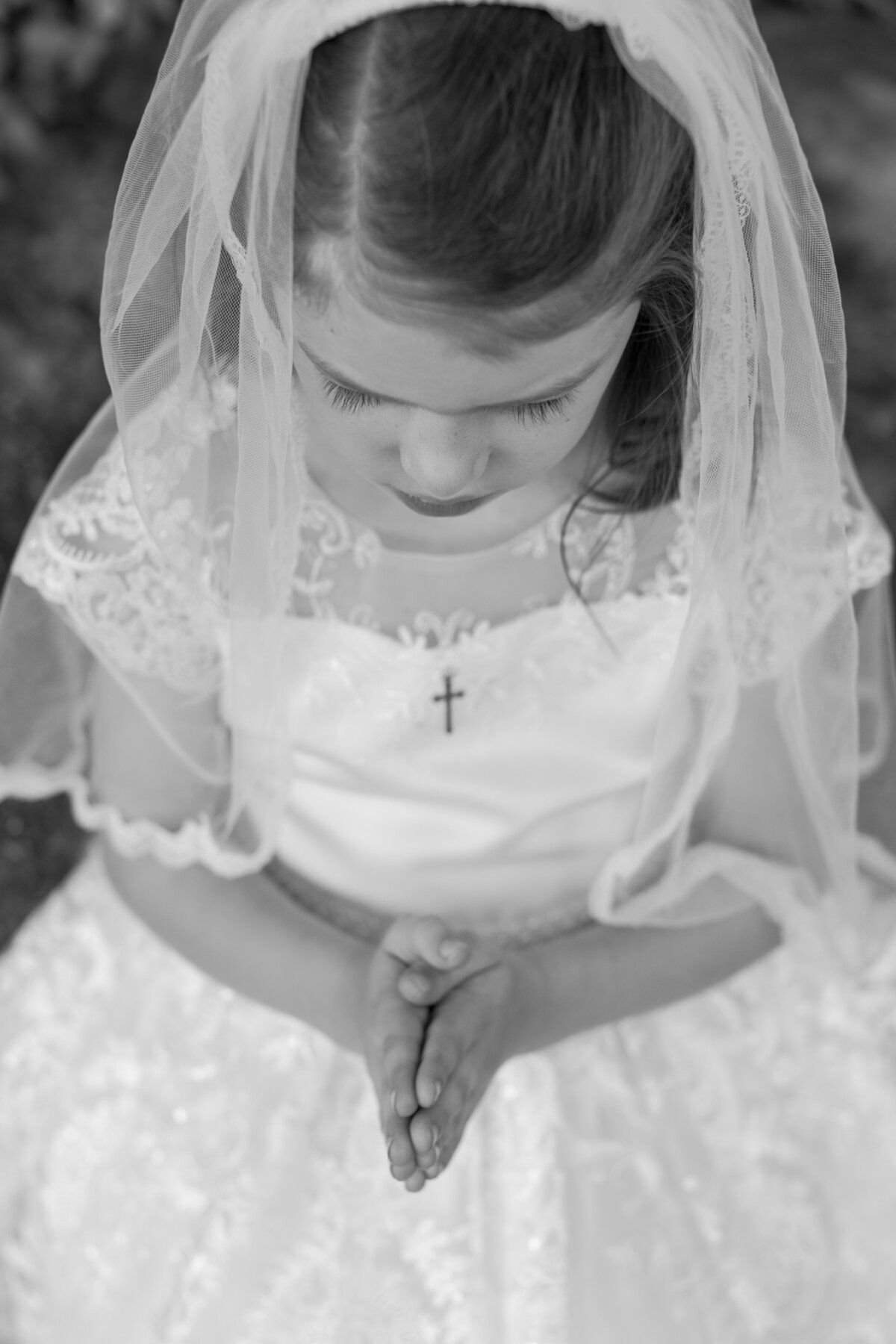black and white praying child hands