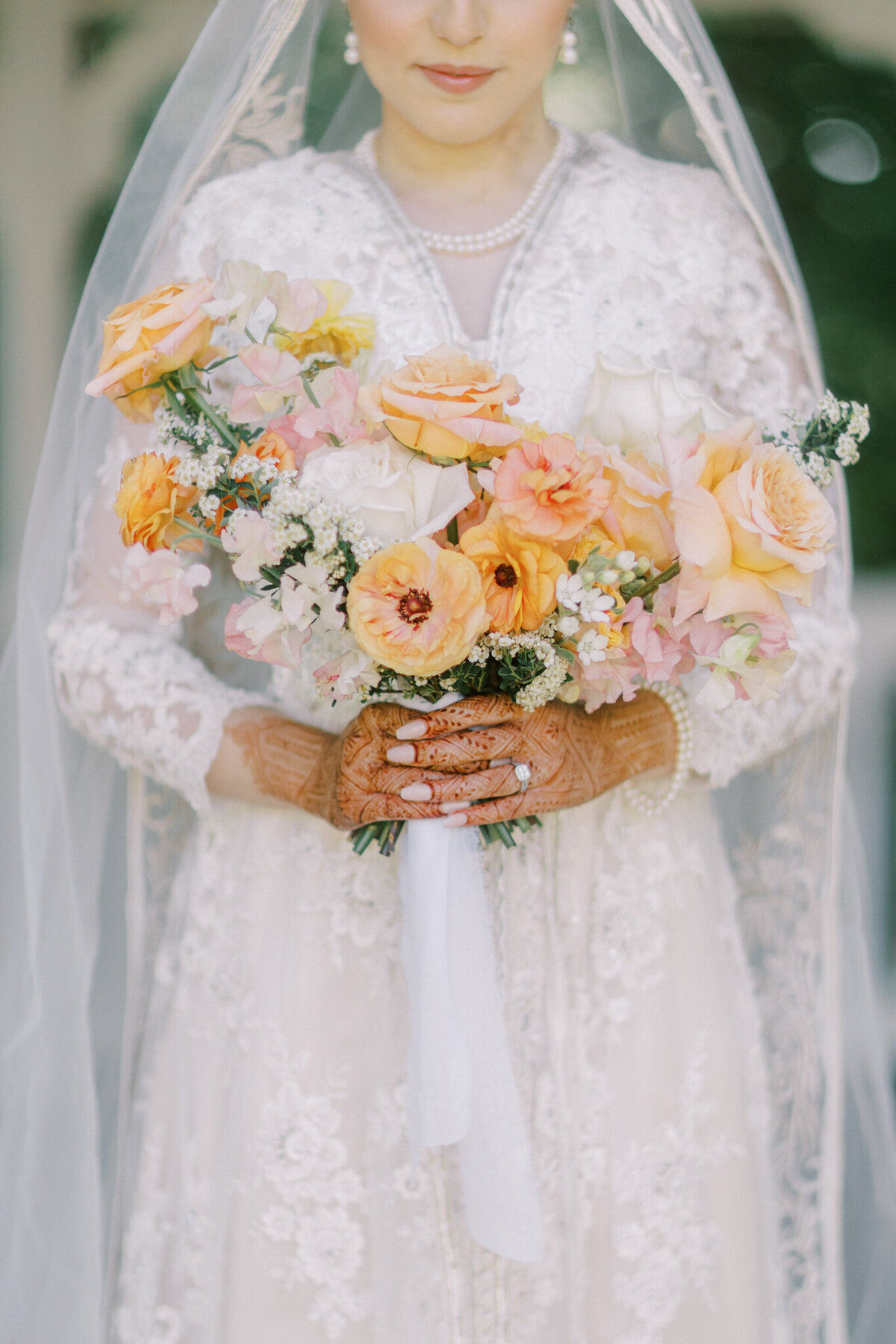 Peach and white, spring-inspired bridal bouquet by The Romantiks, romantic wedding florals based in Calgary, AB & Cranbrook, BC. Featured on the Brontë Bride Vendor Guide.