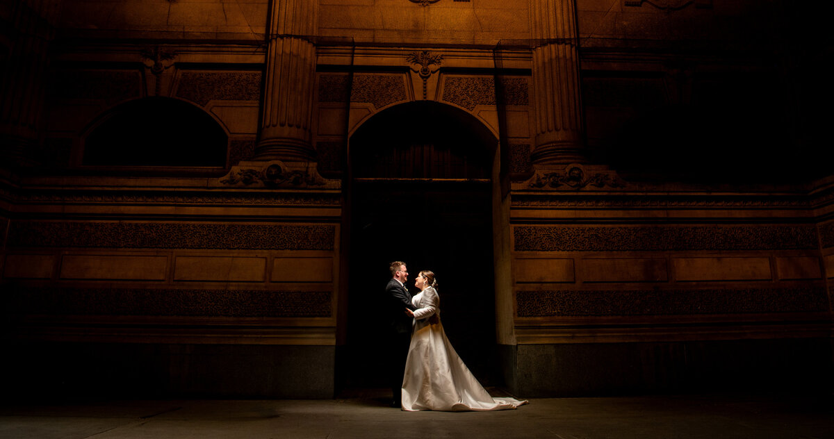 Couple inside city hall in Philadelphia on their wedding day
