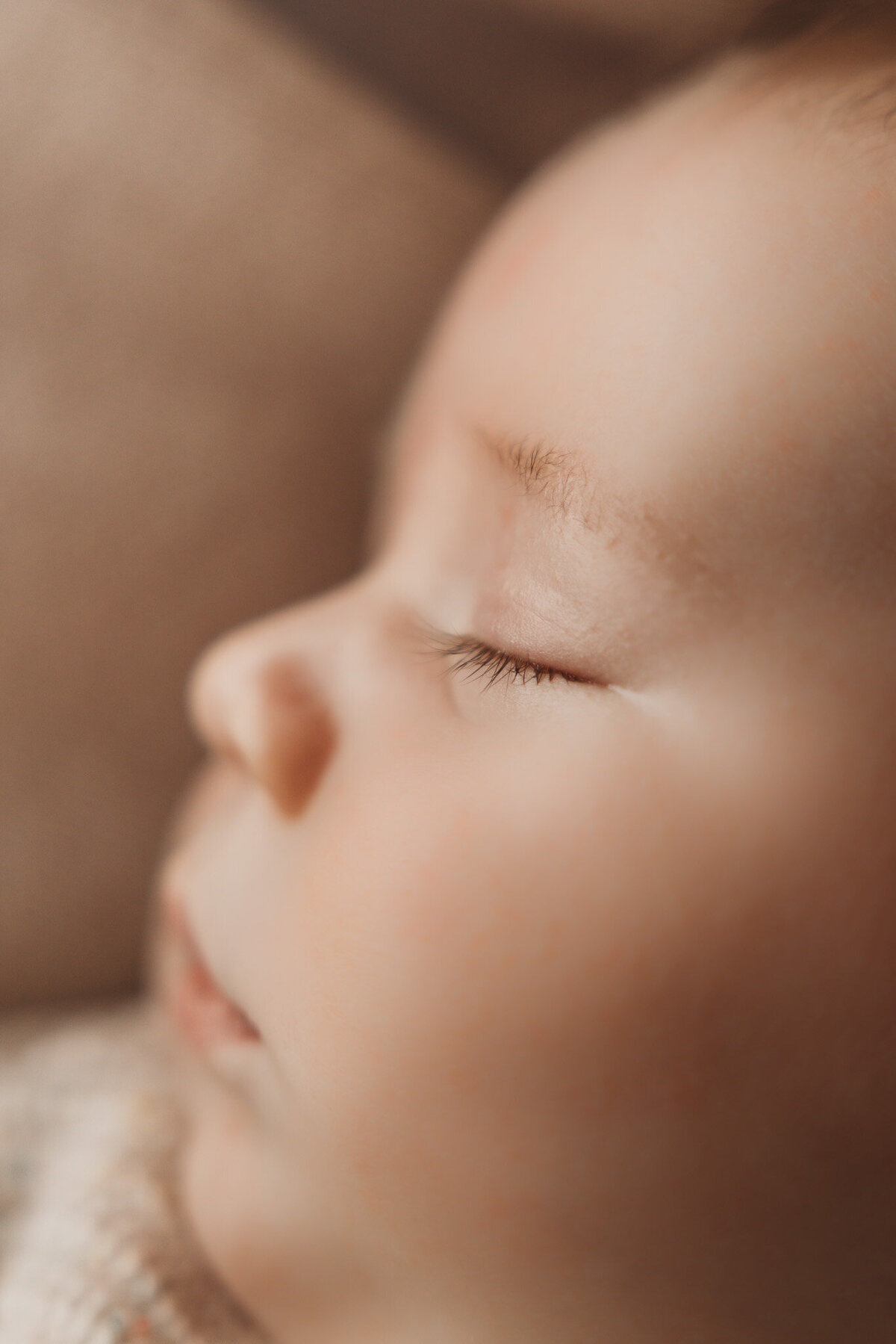 detail of eyelashes of newborn baby captured by Bie in wanaka