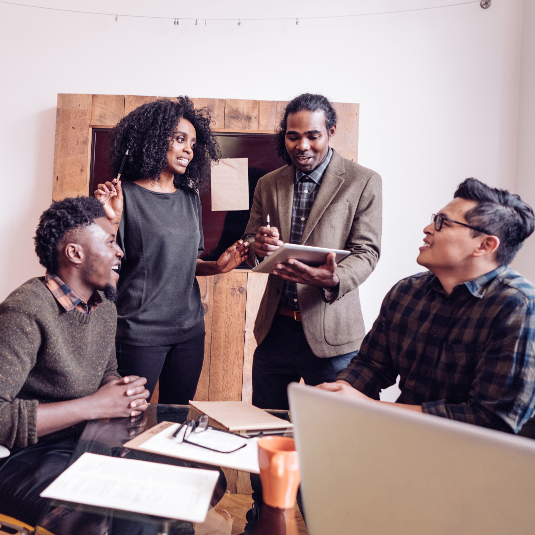 a group of  employees  working together