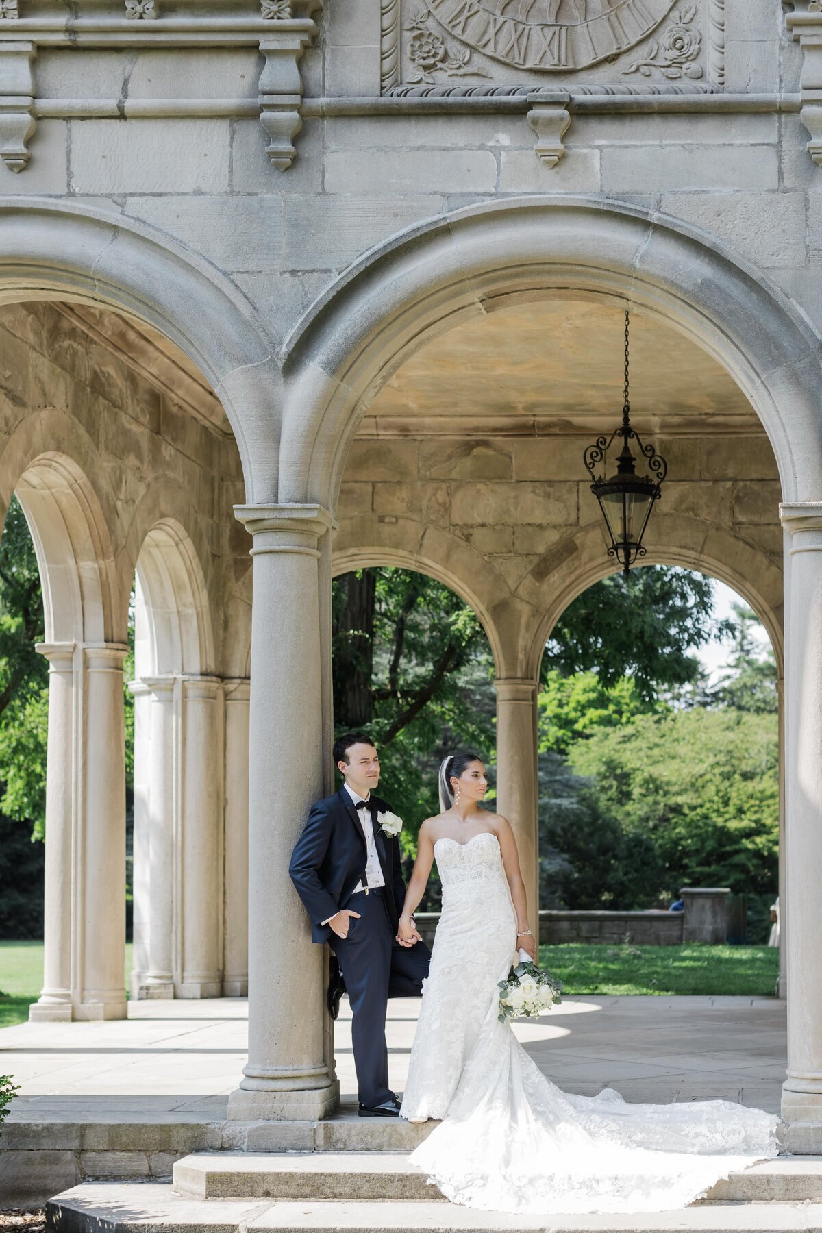 Bride and groom standing on pavillion