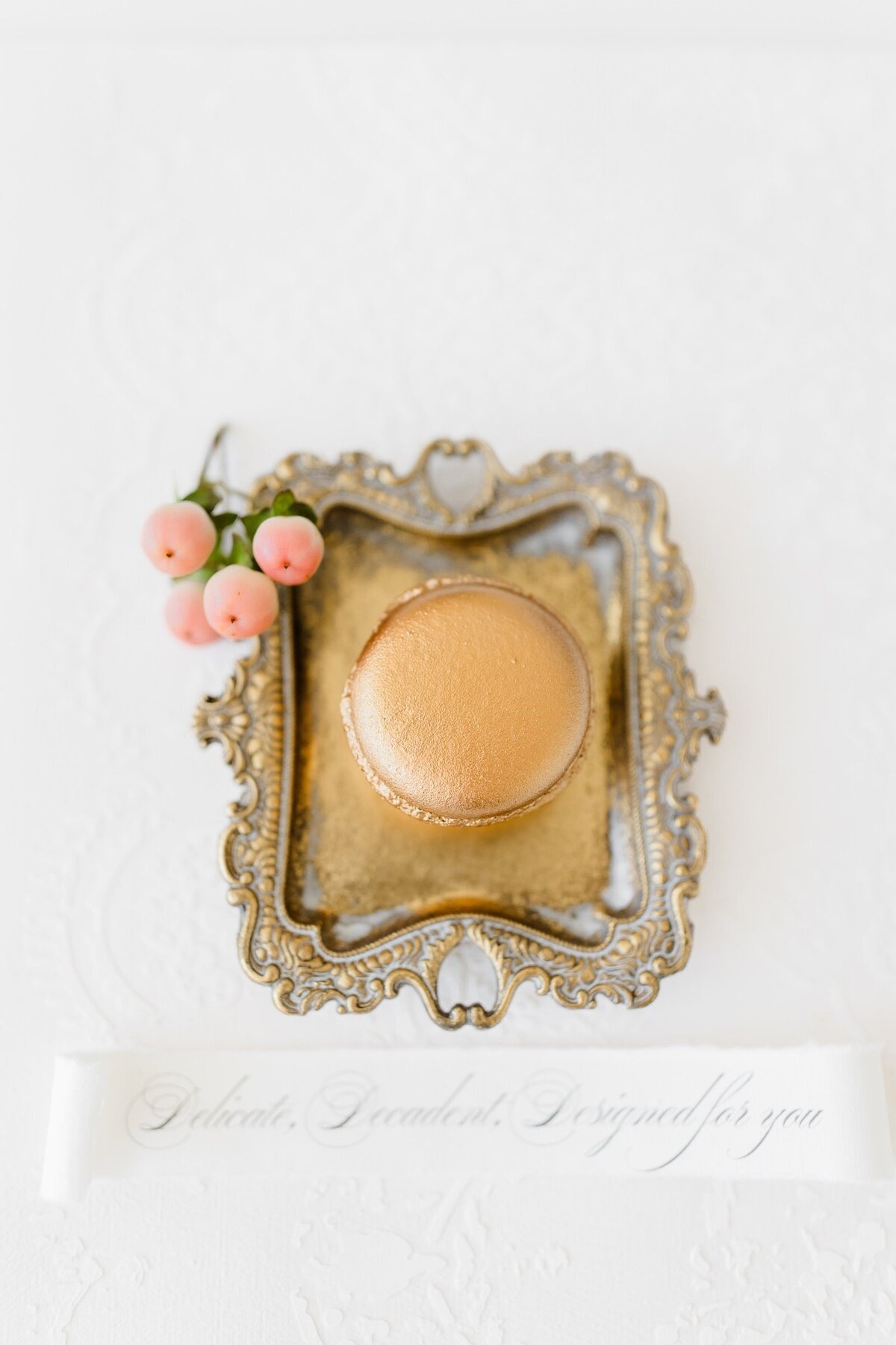 Beautiful bespoke gold macaron specially made for a destination wedding couple in Provance