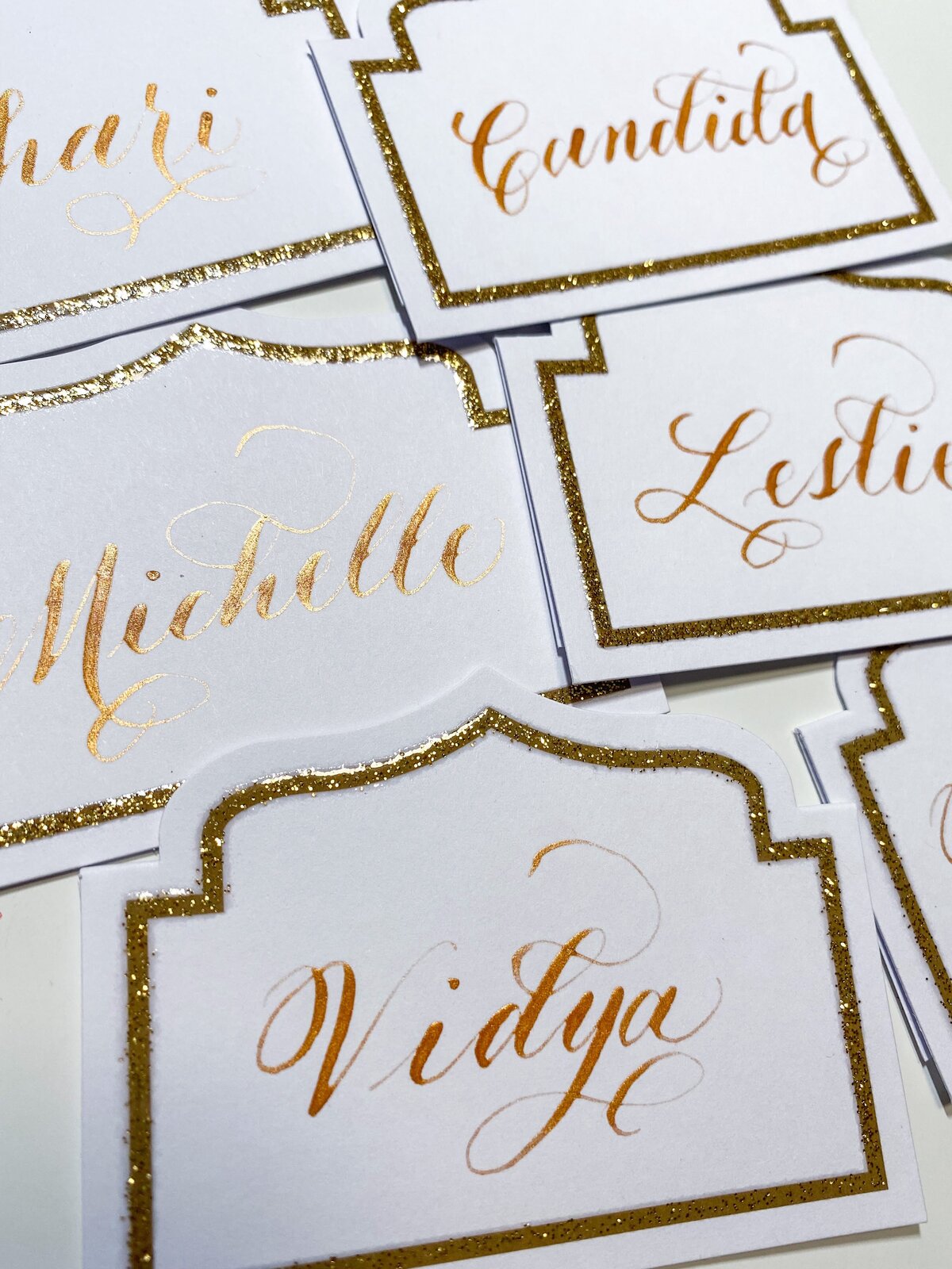 gold ink place cards flourished