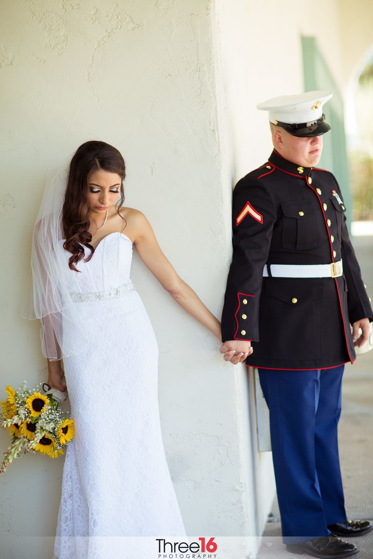 Bride and Groom share a prayer together before the wedding ceremony