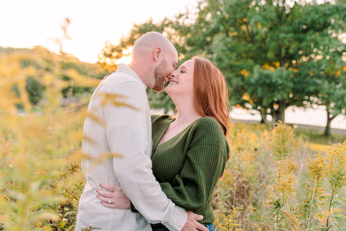 Field of wildflowers golden hour engagement session