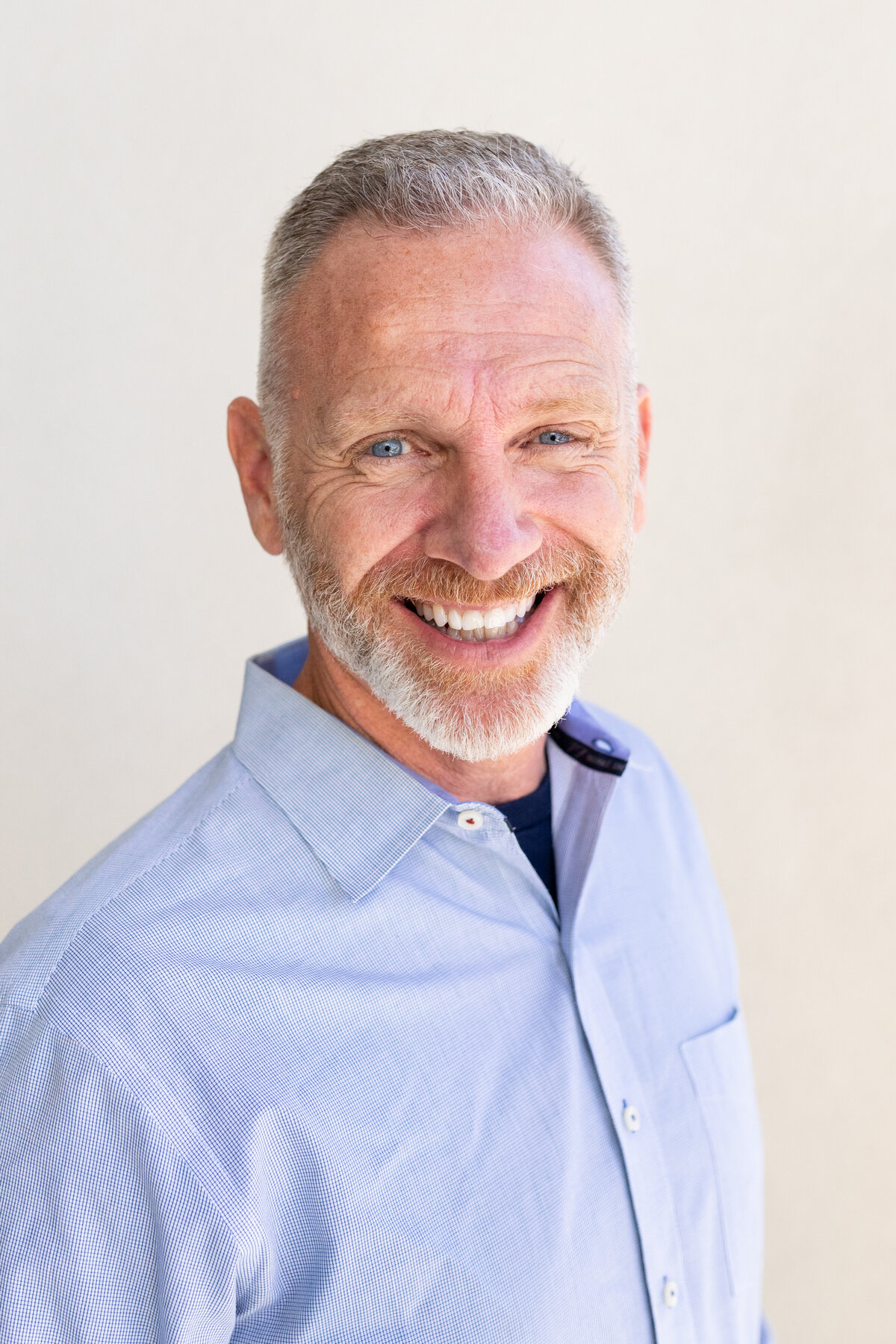 corporate headshots on white backdrop