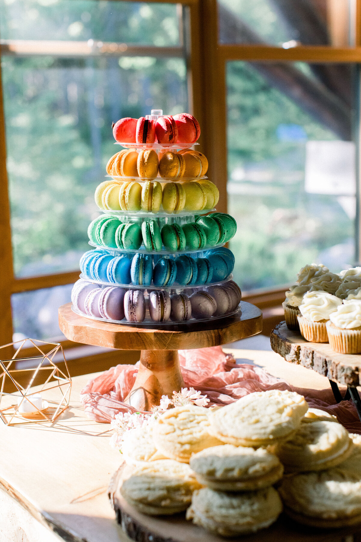 colorful rainbow macaroons at wedding reception at Lakefalls Lodge in Munsonville