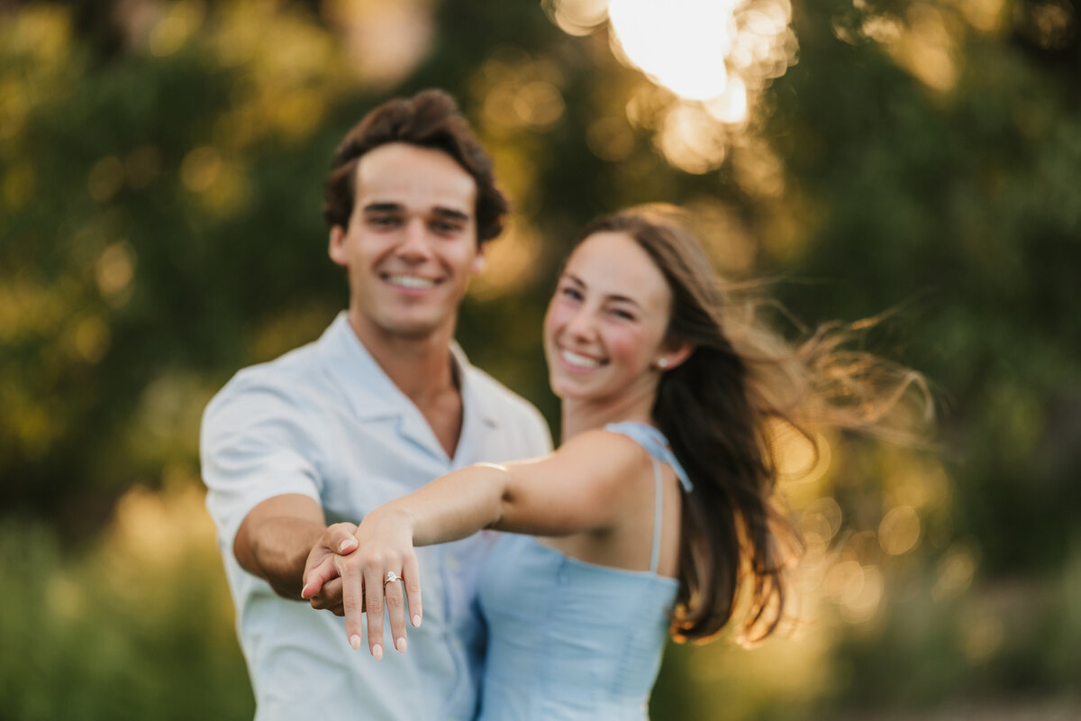 couple-shows-off-engagement-ring