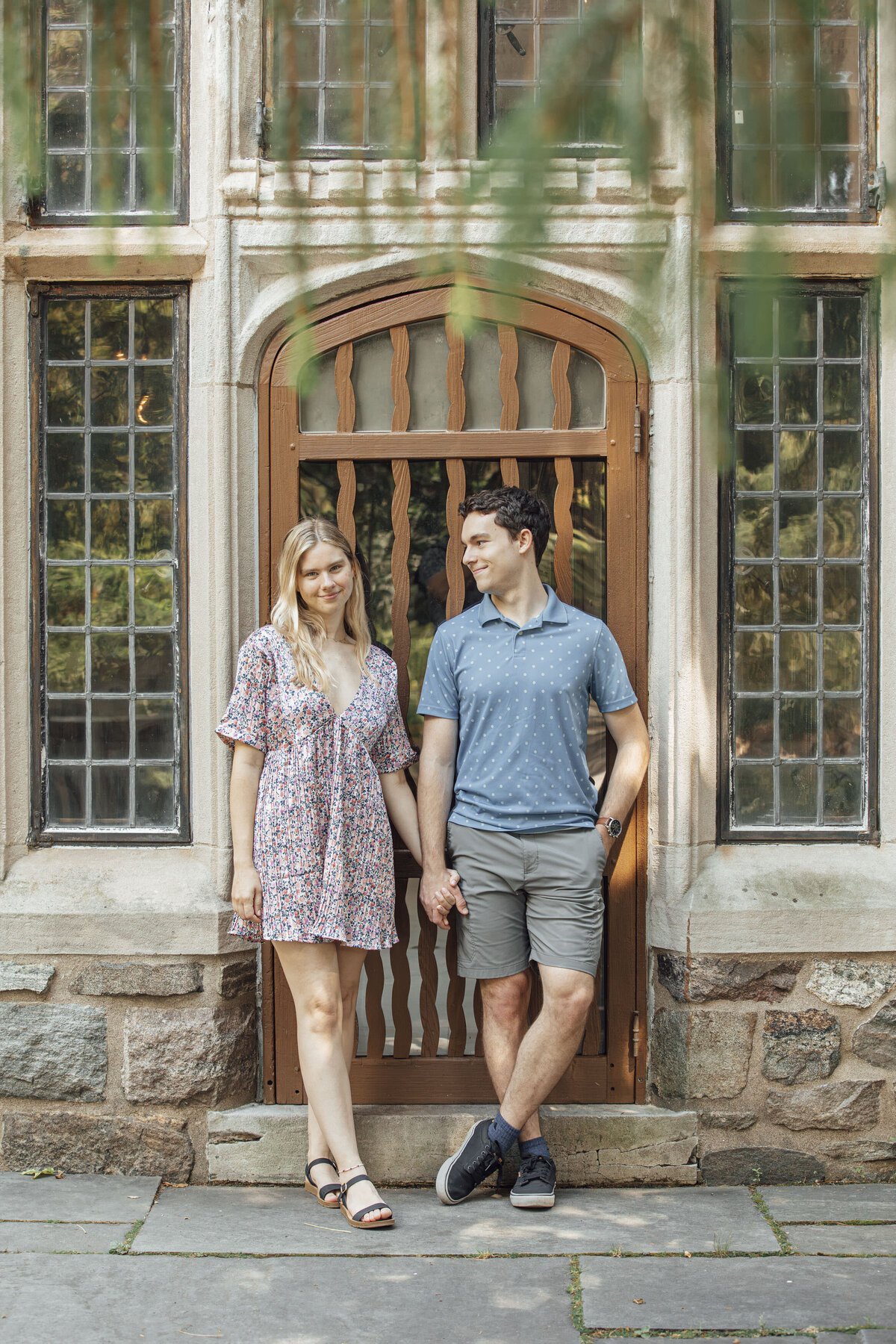 Proposal Photos | Groom-to-be proposing in the gardens surrounded by vibrant flowers and greenery at New Jersey Botanical Gardens | Ringwood, New Jersey