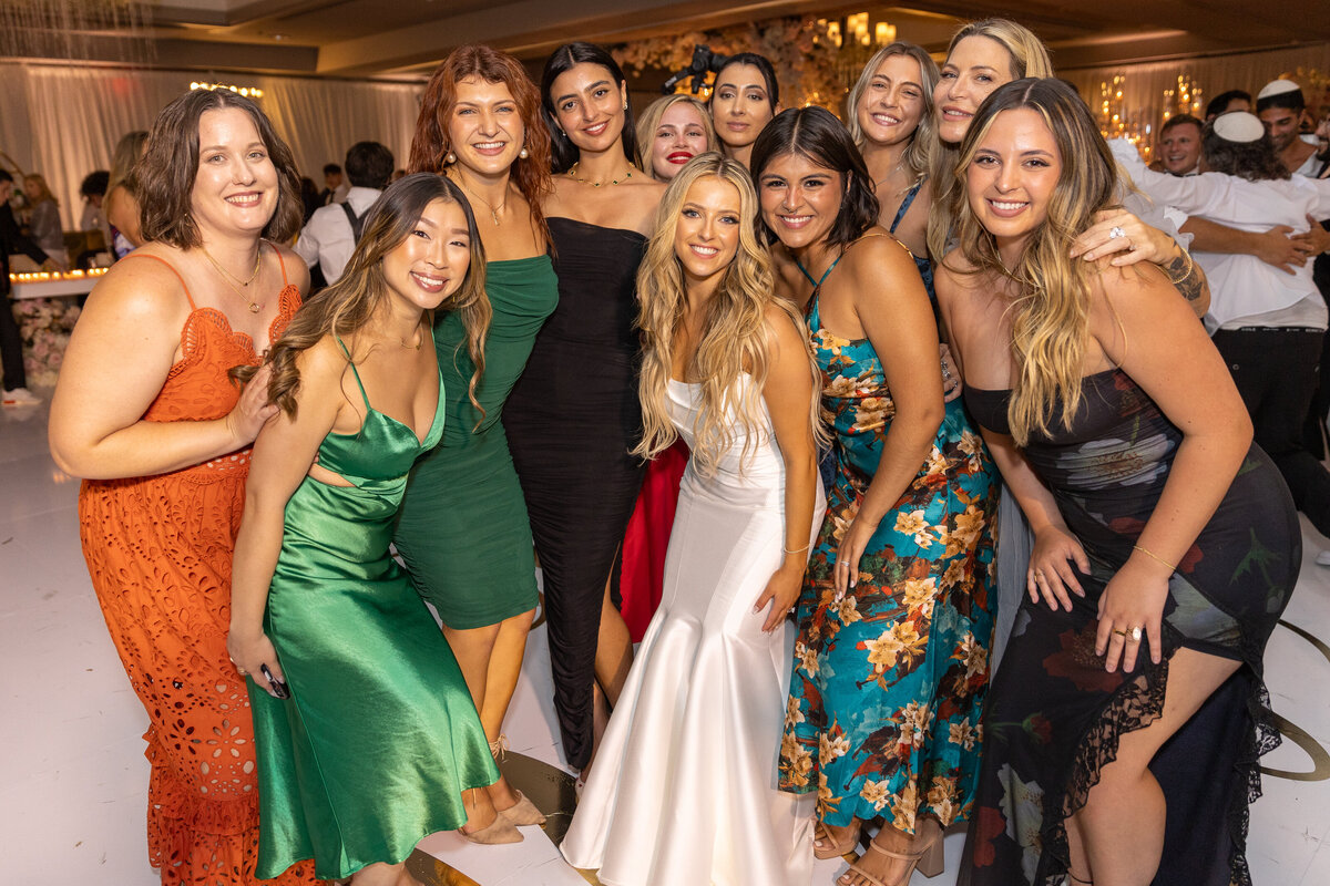 Wedding guests standing together and smiling