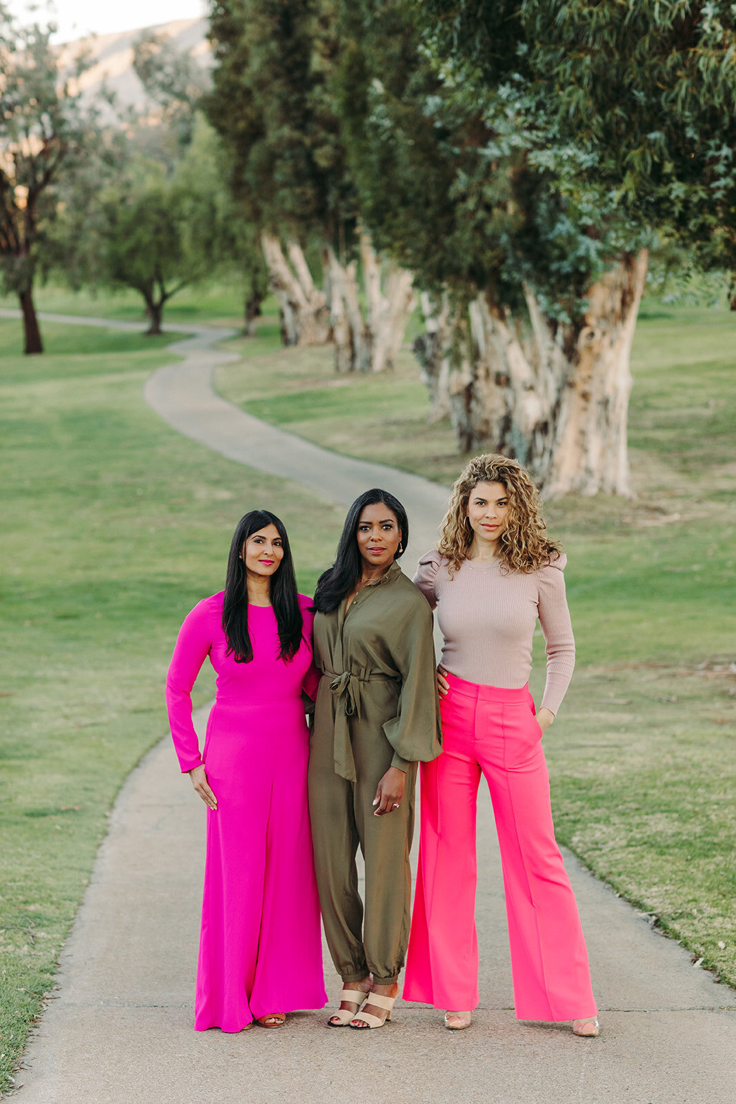 Utah Family Photographer captures women in park wearing bright colored pants 