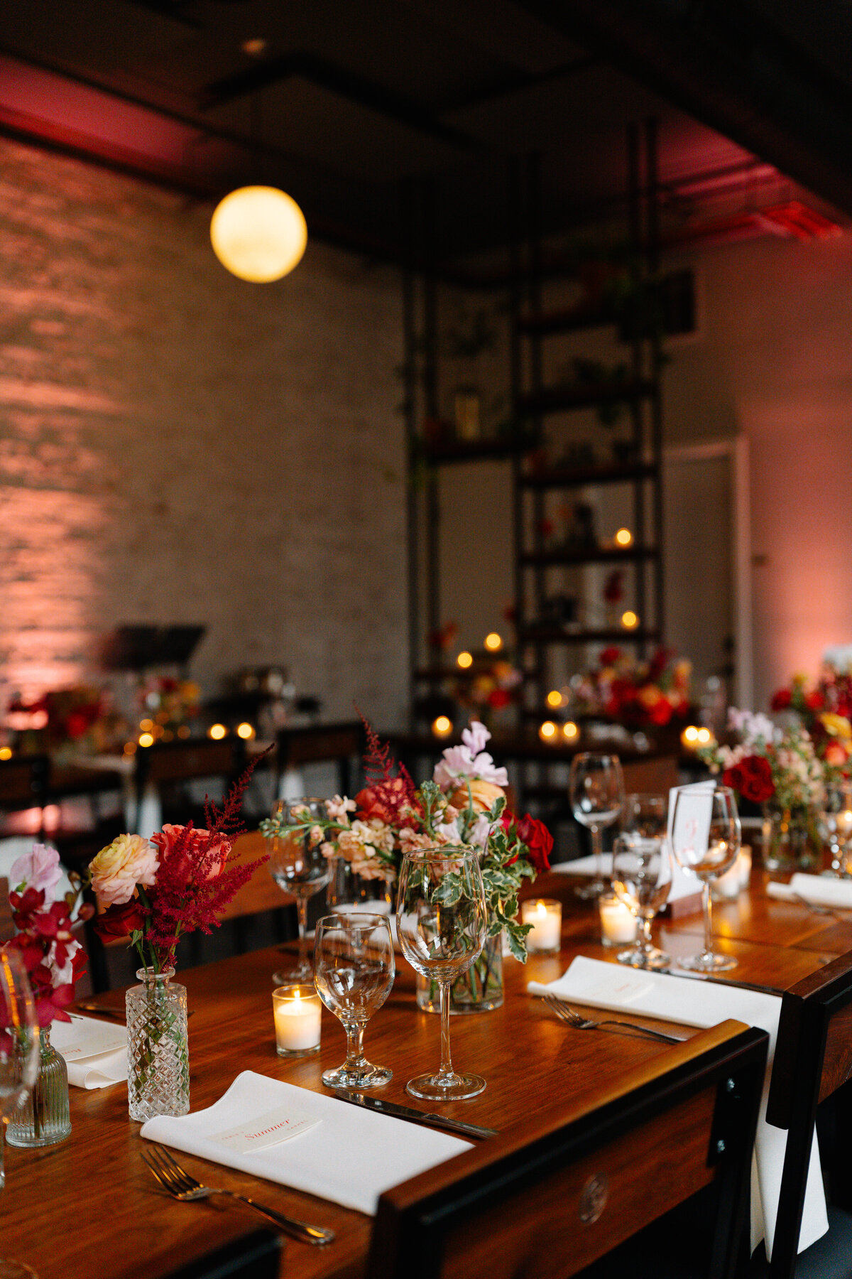 bud vase and candle along table wedding centerpiece inspo