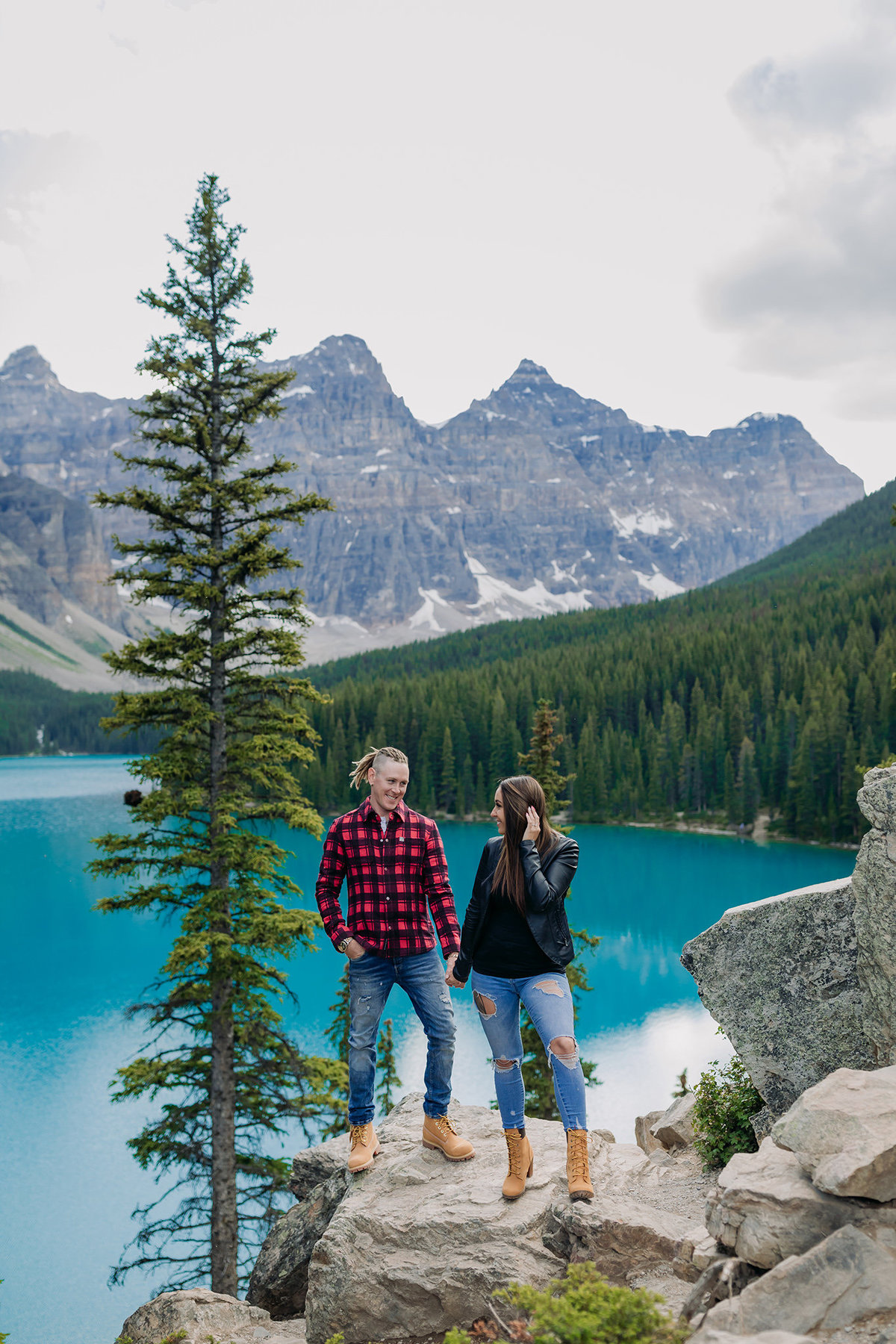 casual moraine lake mountain style engagement photos