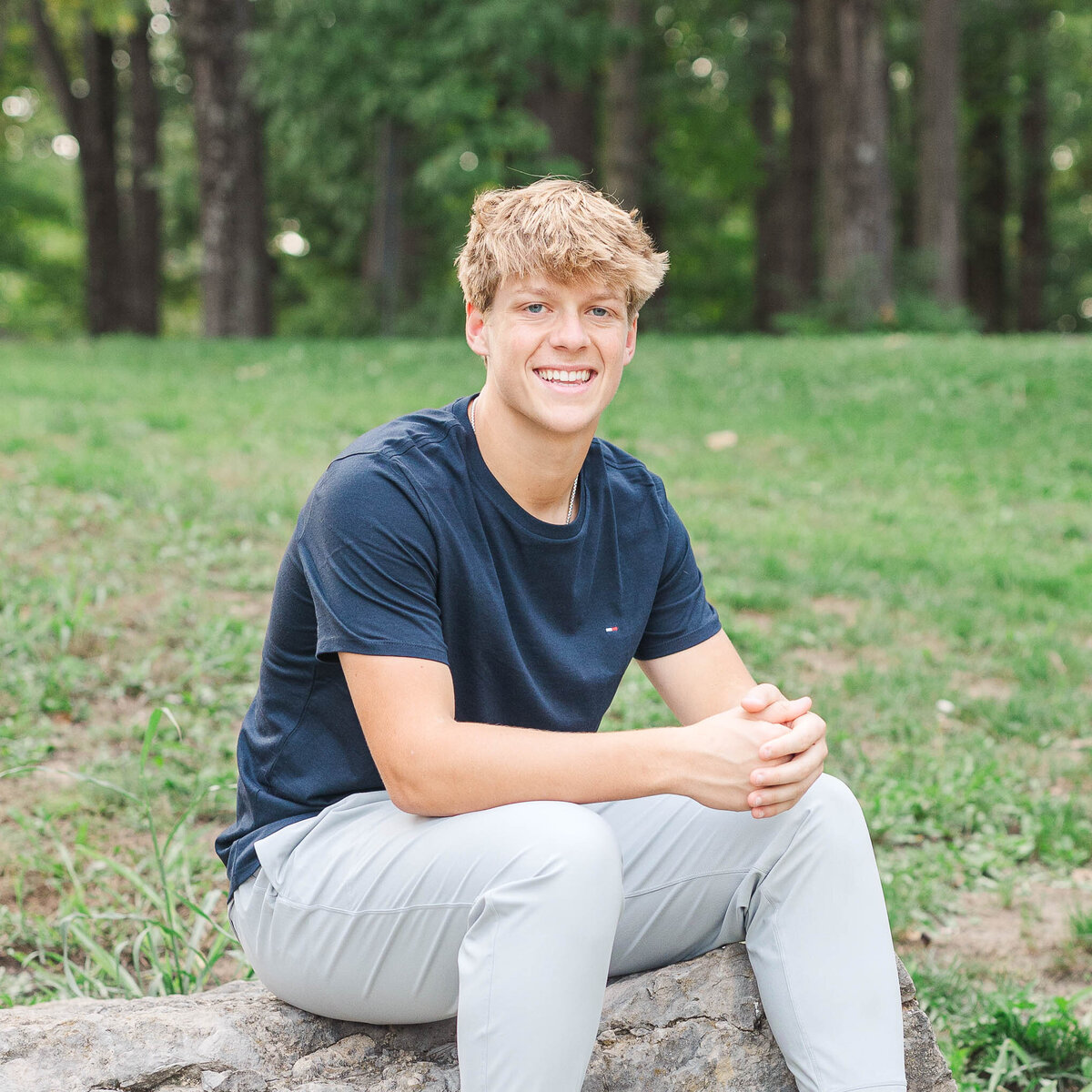 Senior pictures at Griggs Reservoir in Columbus, Ohio, showcasing fall colors and a stylish outfit.