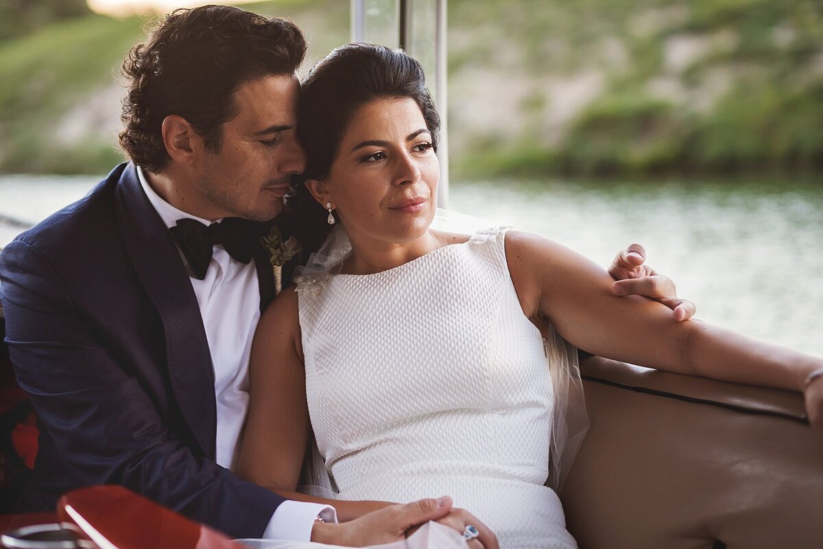 Bride and groom on boat at Banyan Tree Mayakoba, Riviera Maya wedding