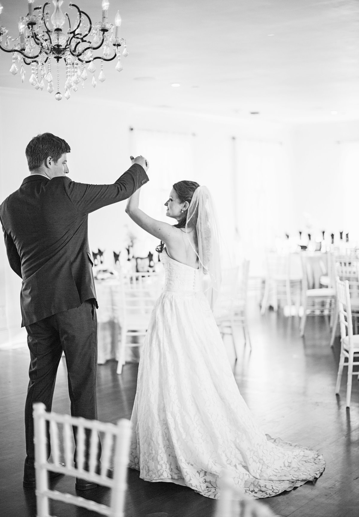 bride and groom dancing at reception