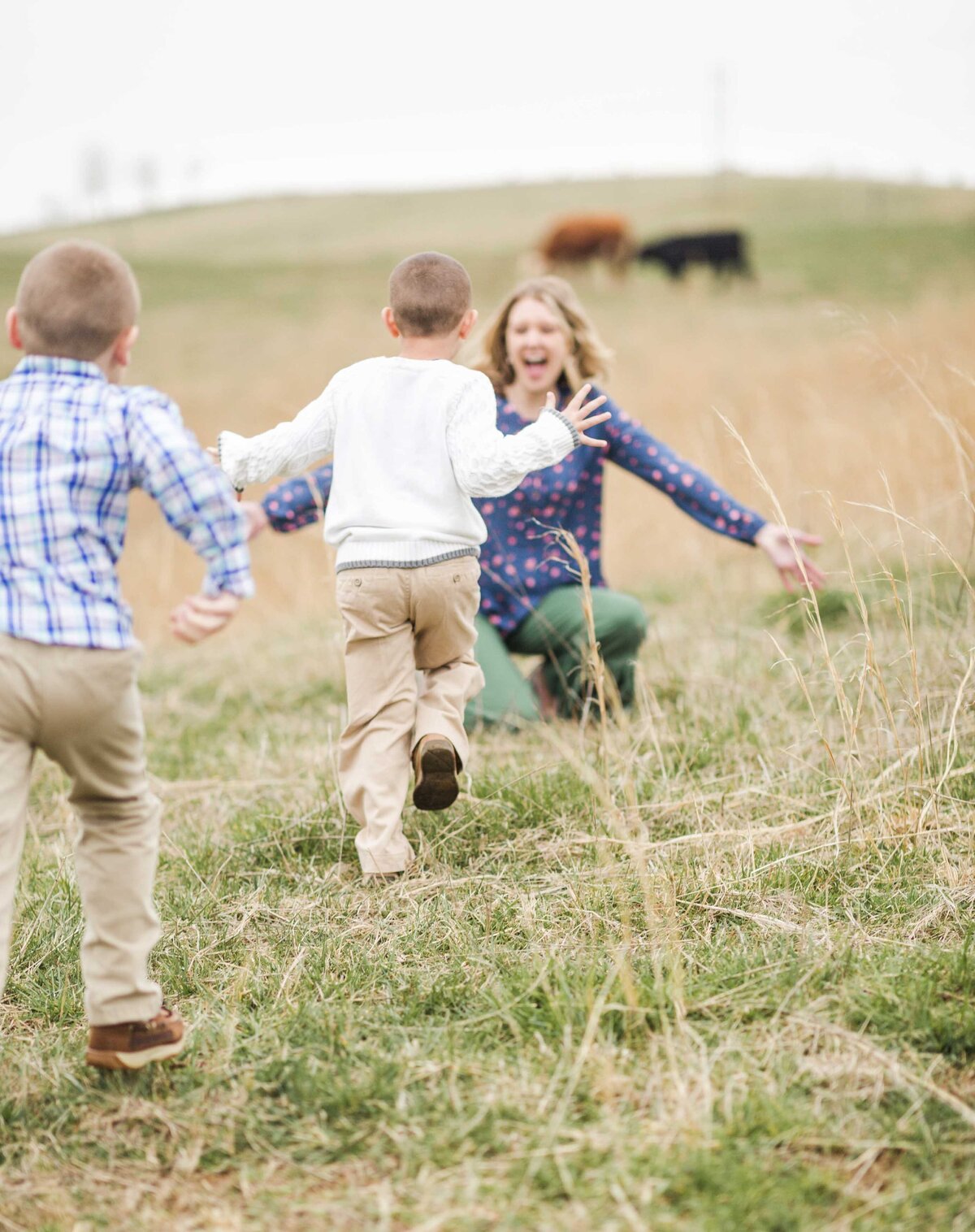 young boys running to their mom