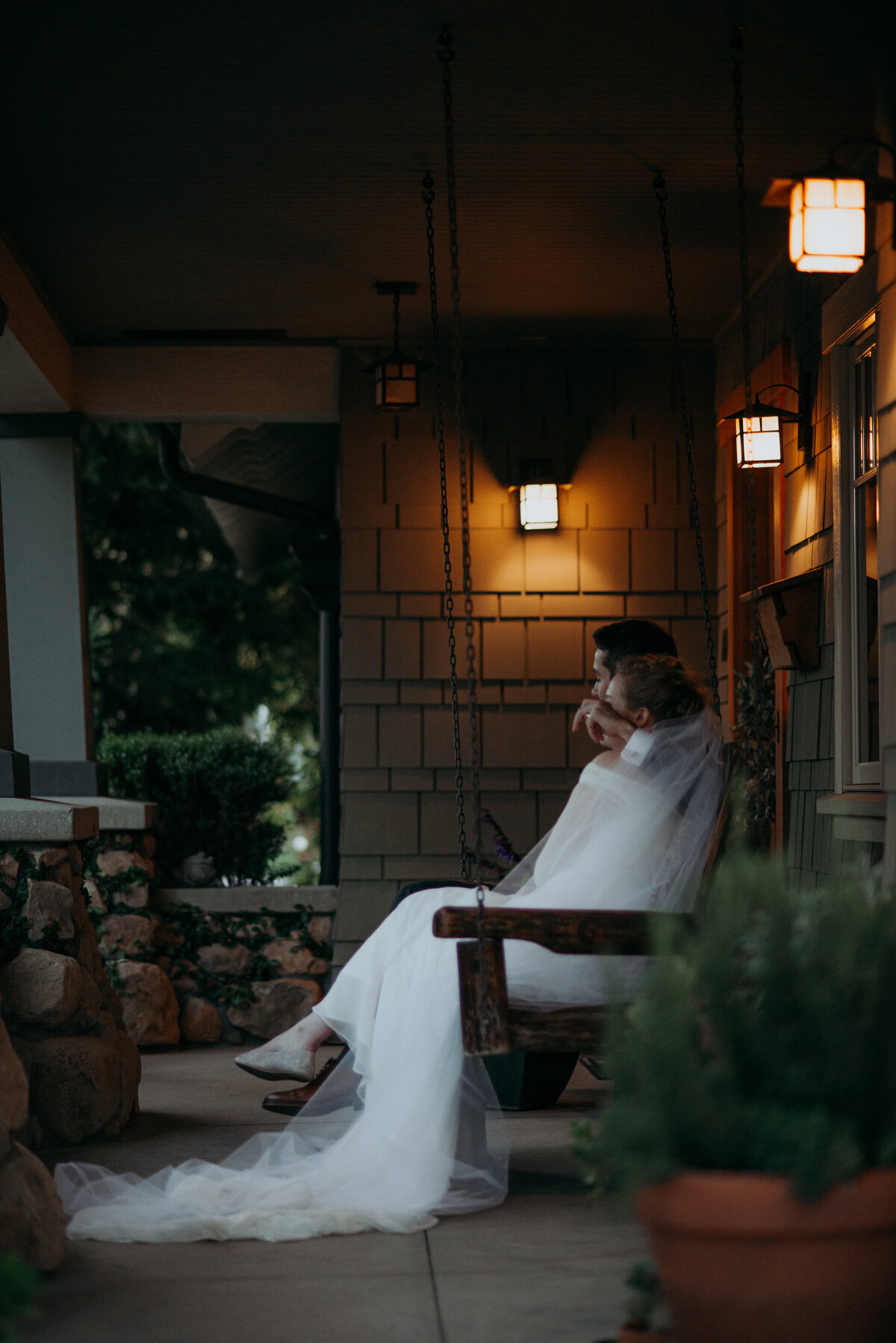 A couple making time to take a break from their wedding reception on a hot day in California.