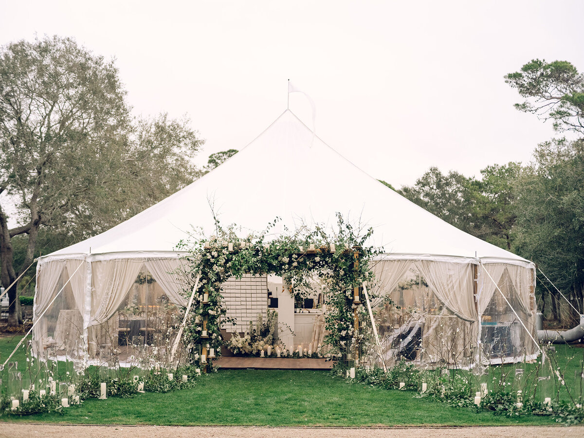 destin-wedding-sailcloth-tent-floral-entrance