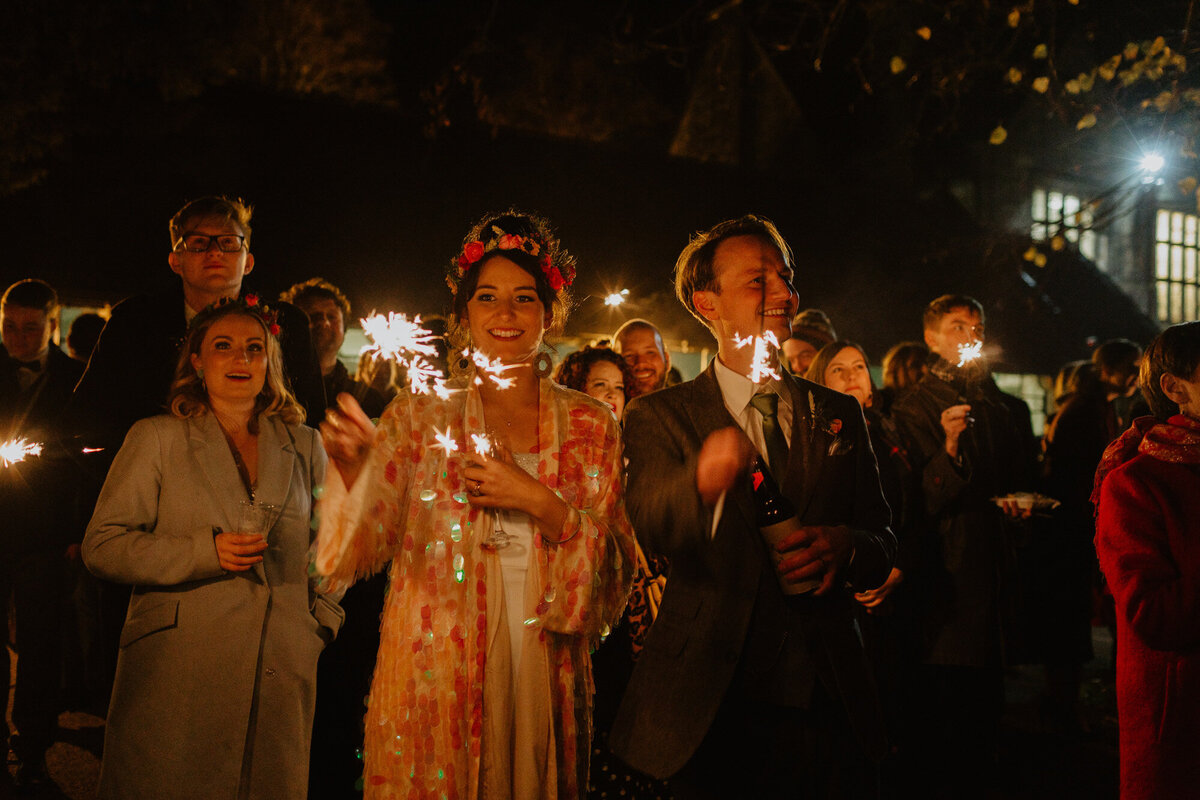 bride and groom with sparklers