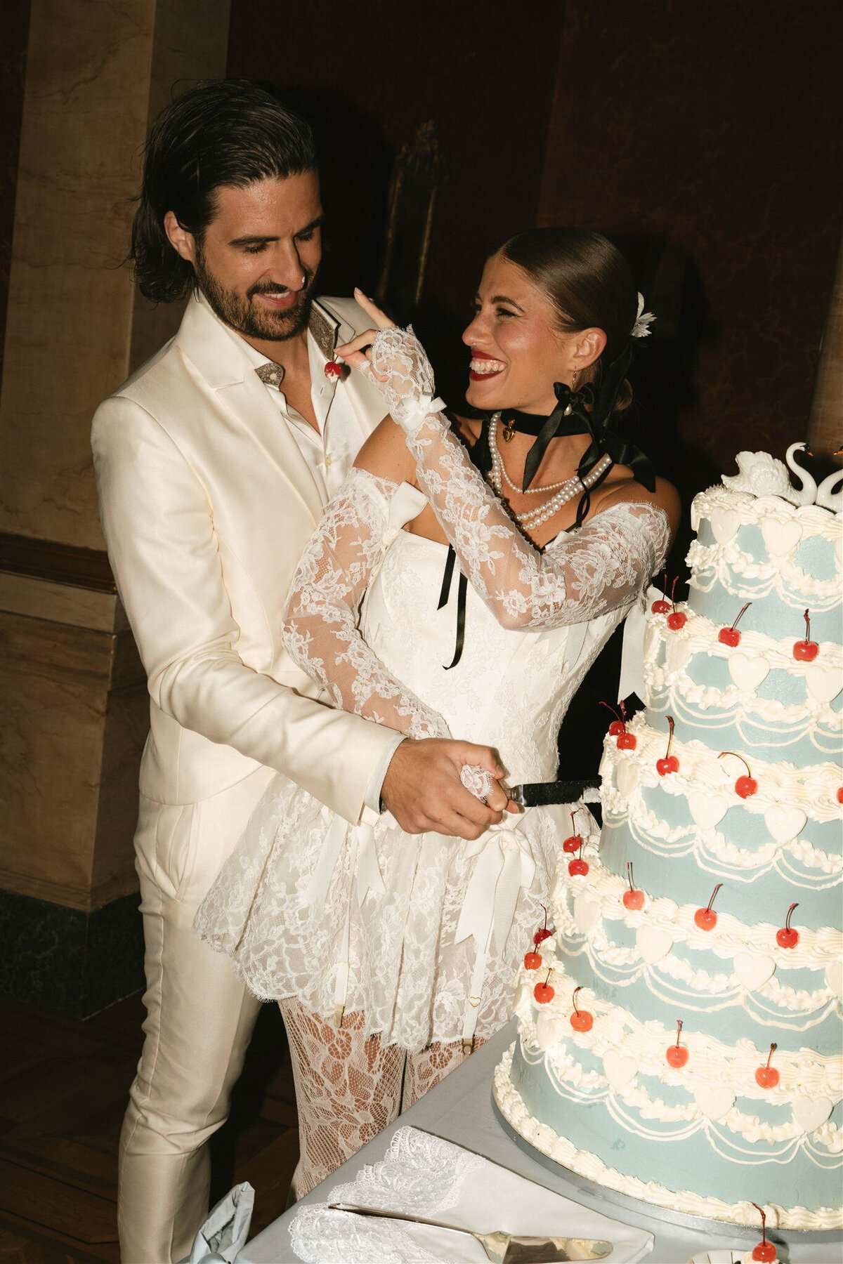 cake cutting in lake como europe fun laughing candid