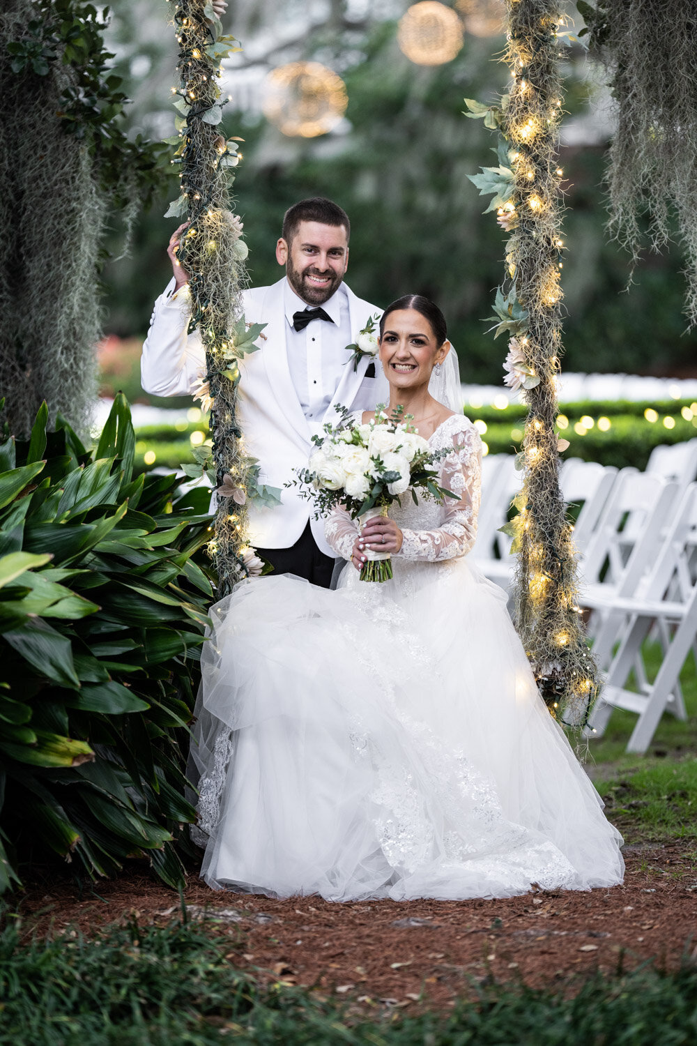 Couple by Southern Oaks swing
