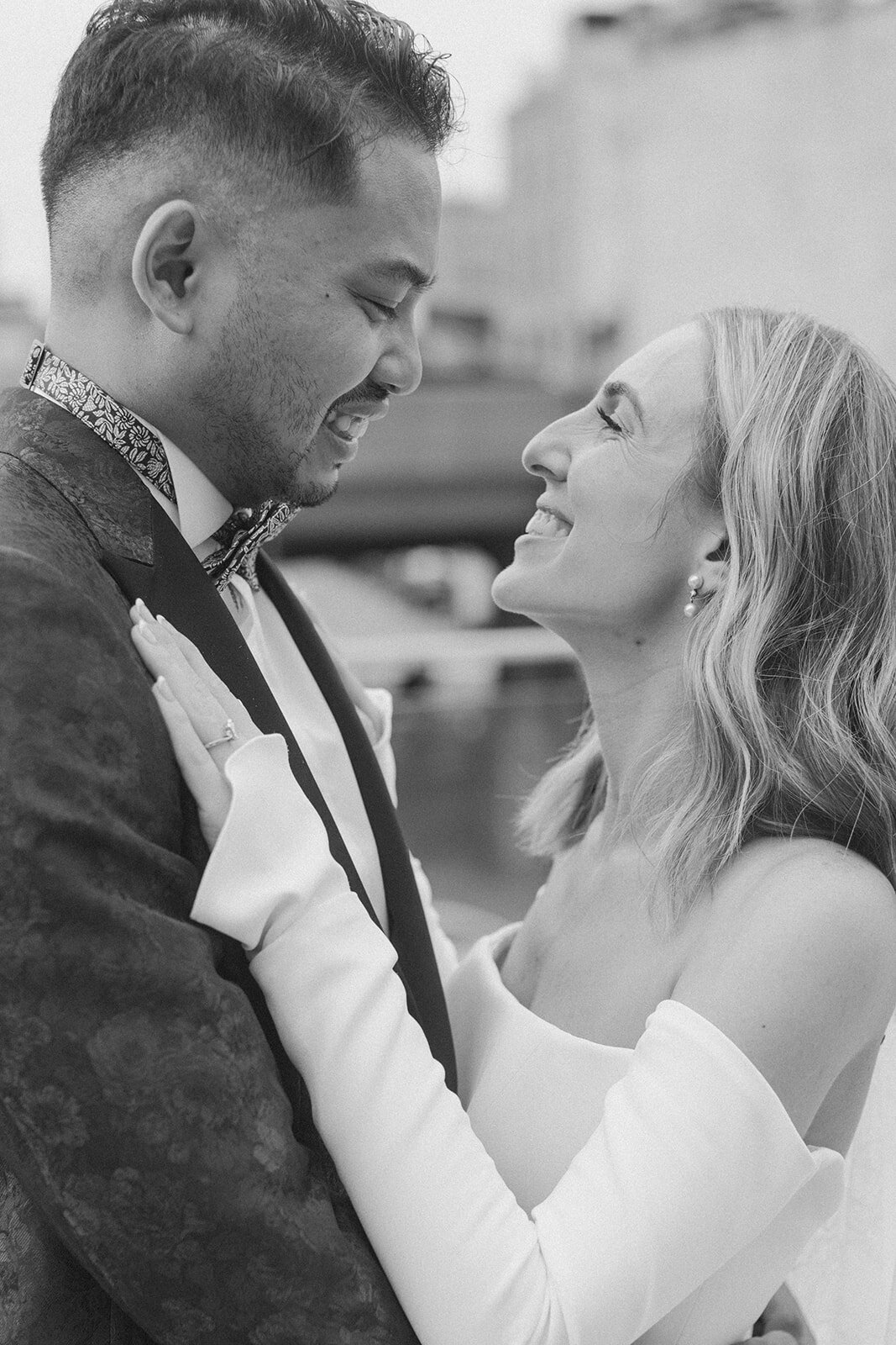 black and white close up of bride and groom 