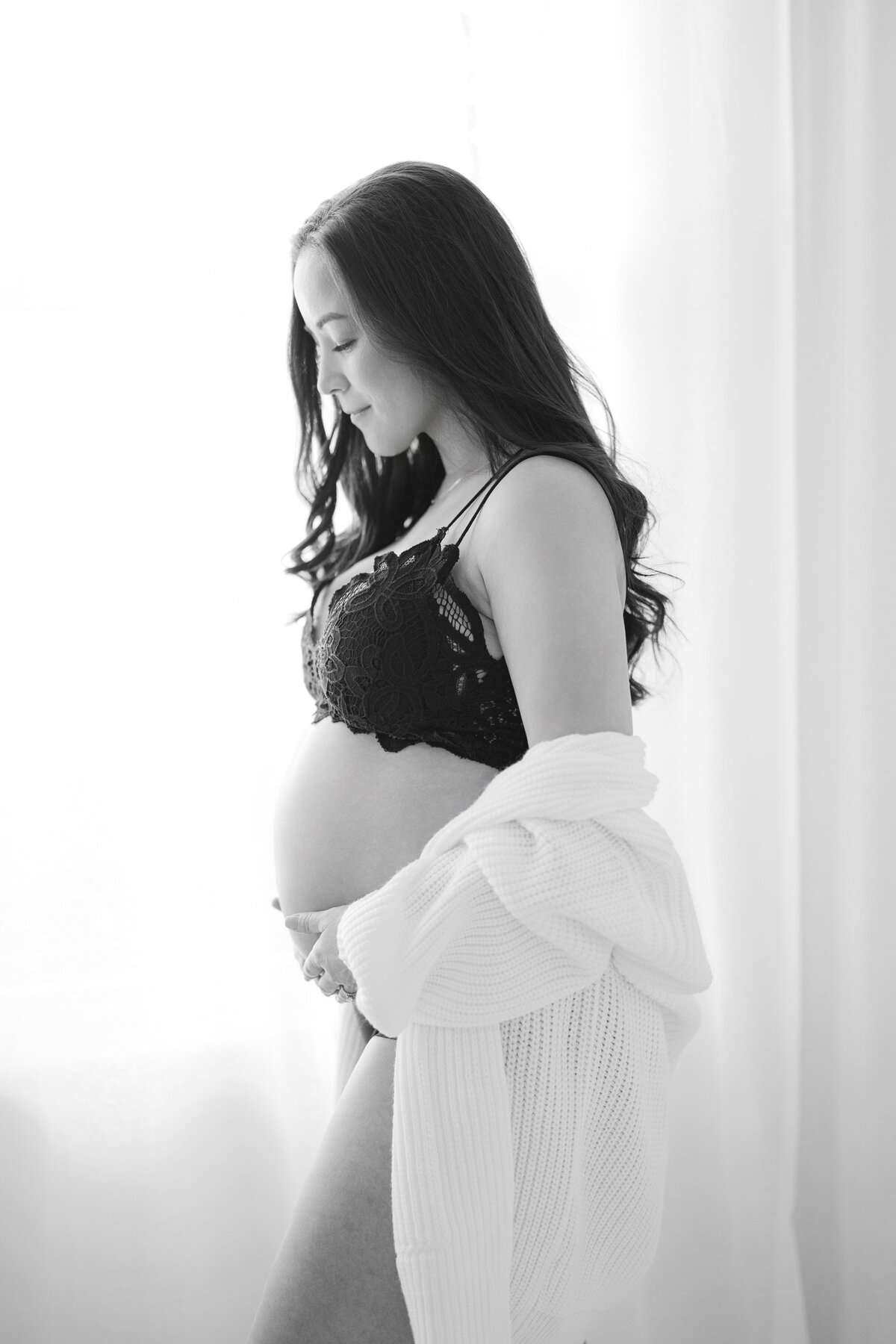 Elegant maternity portrait of Lori and Christina in Tampa natural light studio