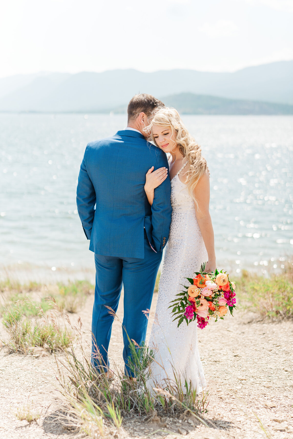 Lake Dillion Reservoir Colorado Elopement Wedding Mountain View Summer Pink and Orange Florals Sparkly Dress Light and Airy Elena Spraguer Photography0123