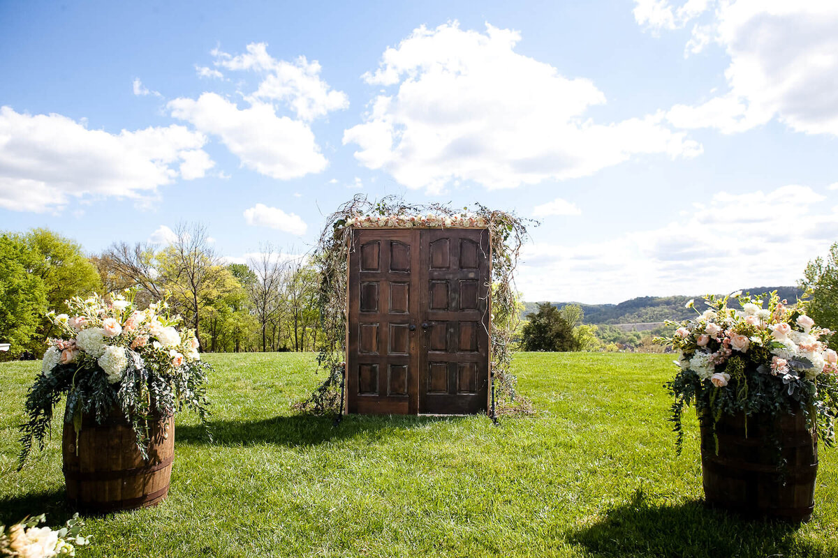 Wedding ceremony doors with greenery