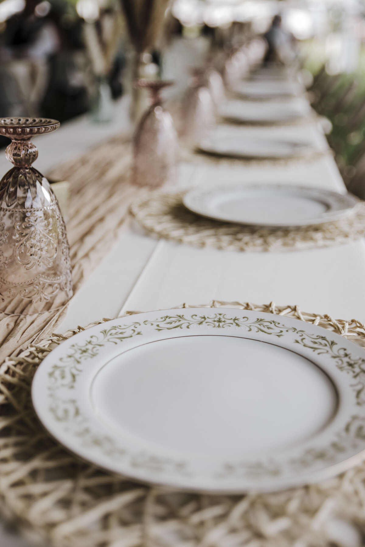 Elegant outdoor dining setup featuring a table adorned with lace and ornate plates, ready for a refined al fresco experience taken by jen Jarmuzek photography a Minneapolis wedding photographer