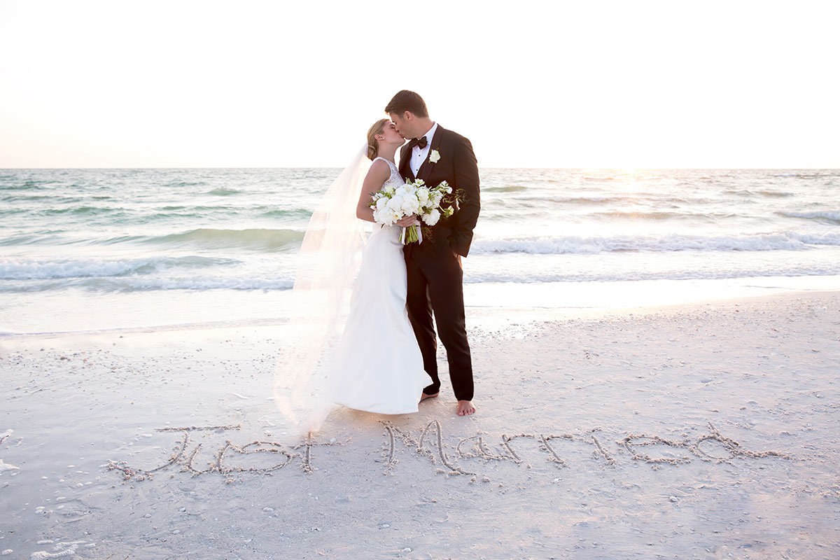 marco beach ocean resort wedding photo just married in sand