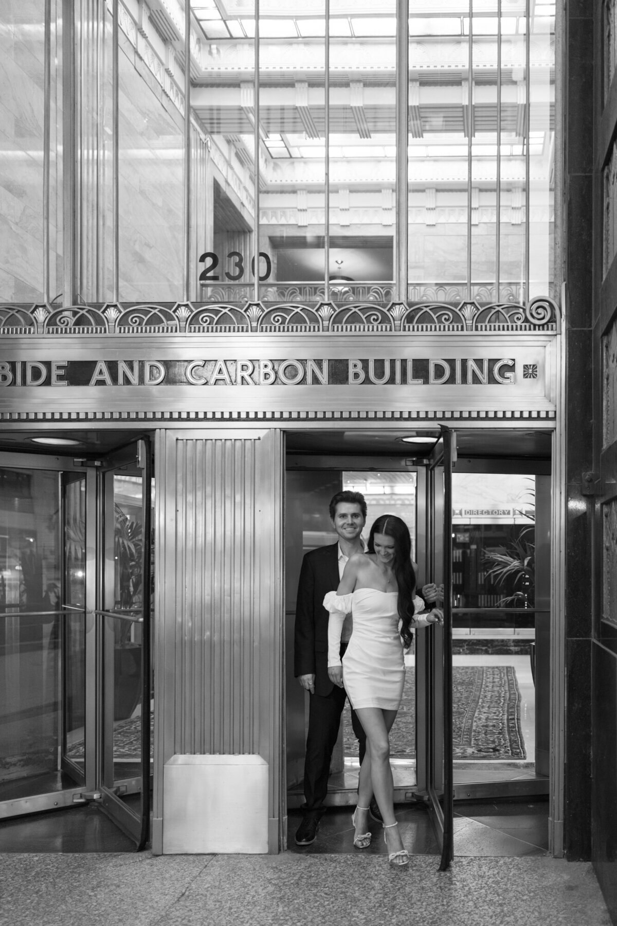 A couple poses inside the Pendry Chicago, capturing an intimate and stylish engagement session in the hotel’s elegant interiors.