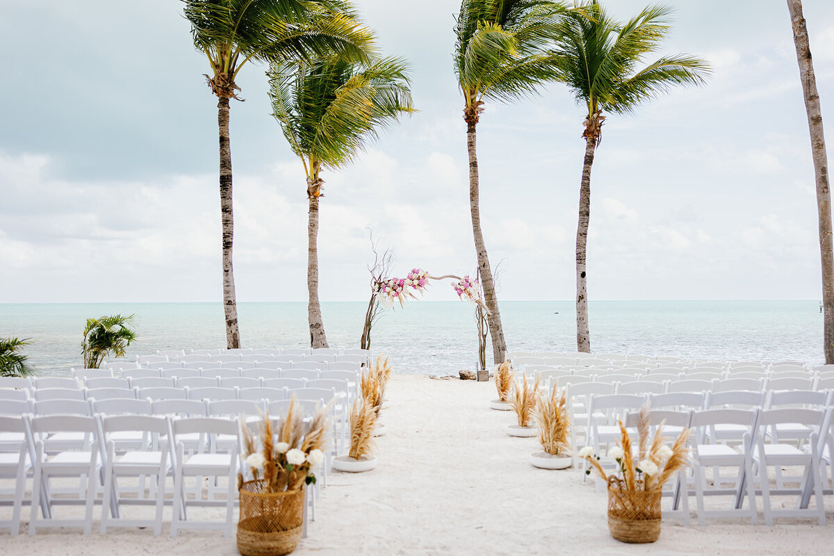 A breathtaking aisle leading to Brenda & Stephen’s oceanfront wedding ceremony at Cheeca Lodge.