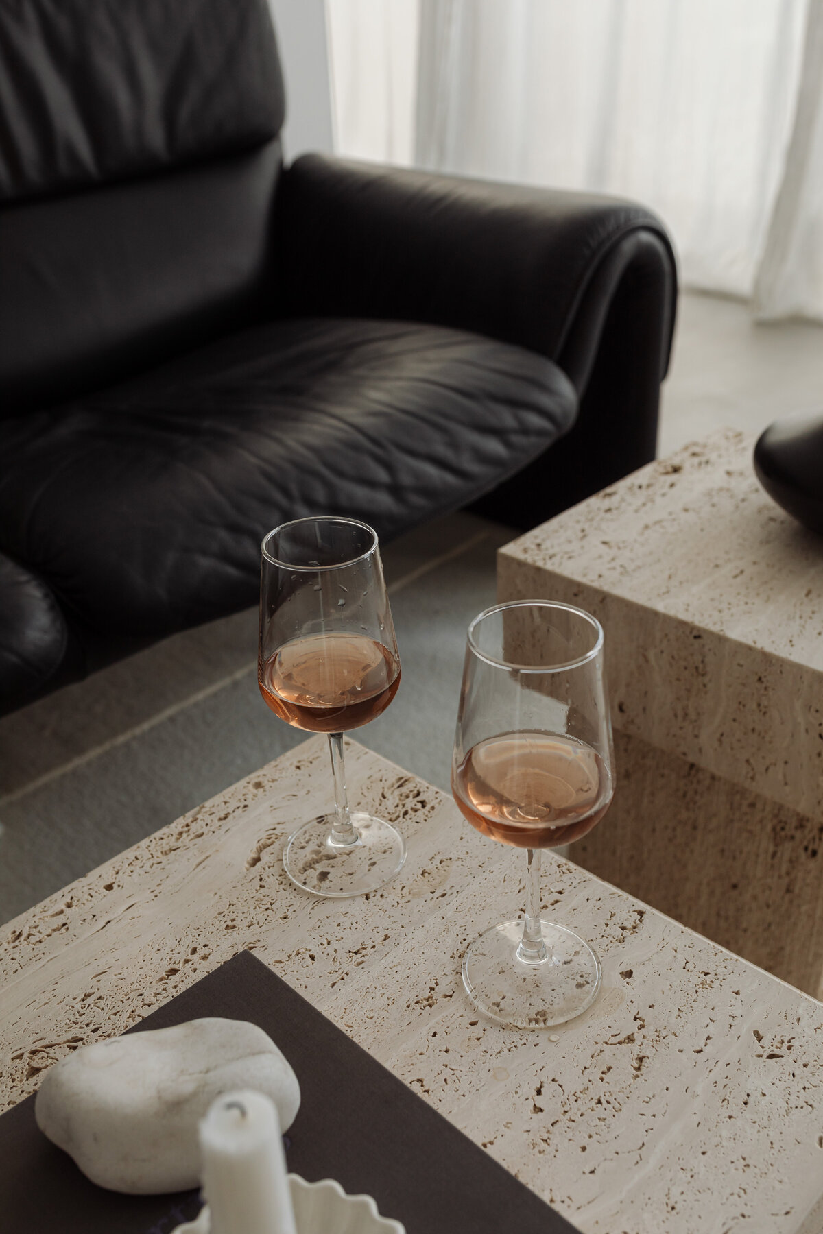 kaboompics_two-glasses-of-rose-wine-on-a-travertine-table-36443