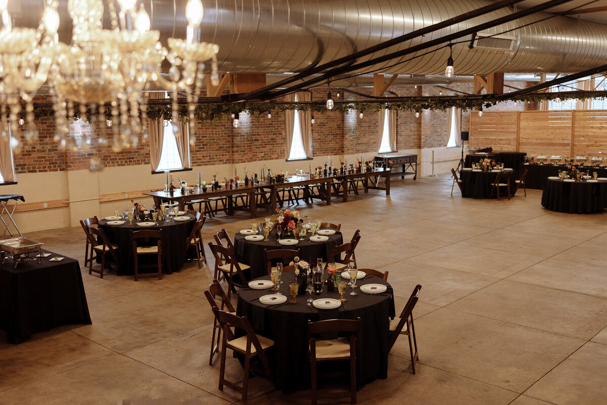 Dark reception setup with black table cloths in Denver, Colorado at Upper Larimer.