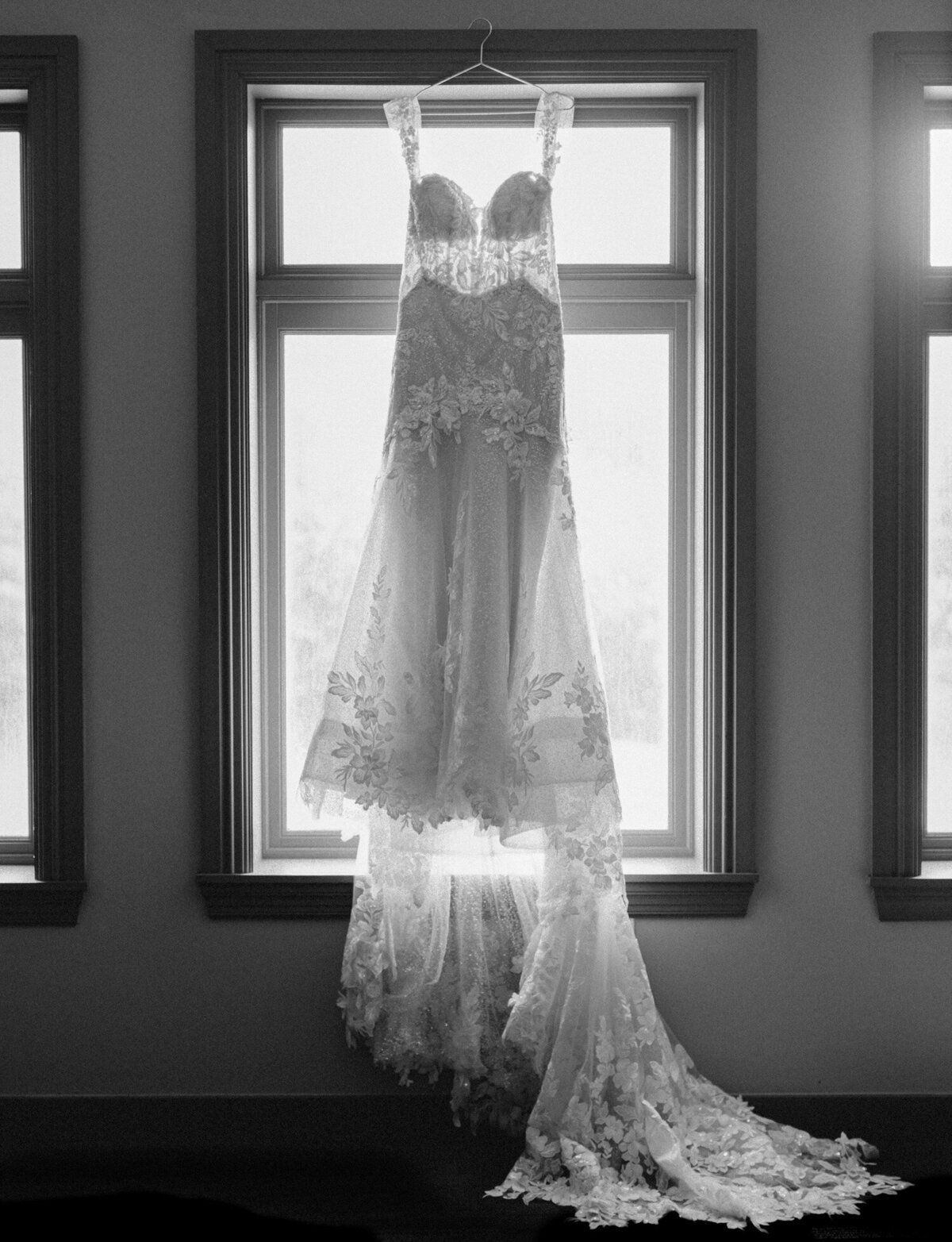 light through a beautiful lace wedding gown with floral detail at the Garden Theater, Detroit