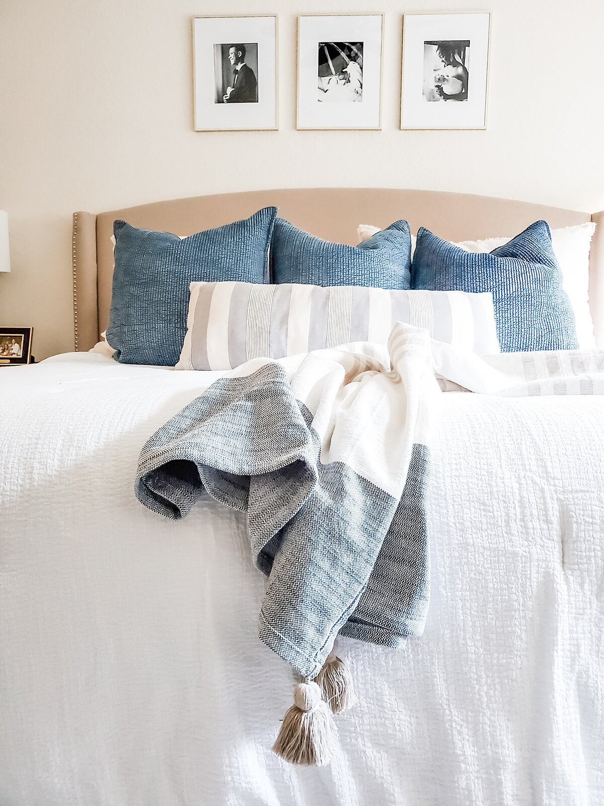 Island Home Interiors coastal throw pillows in Master Bedroom Distance Design Lake Nona