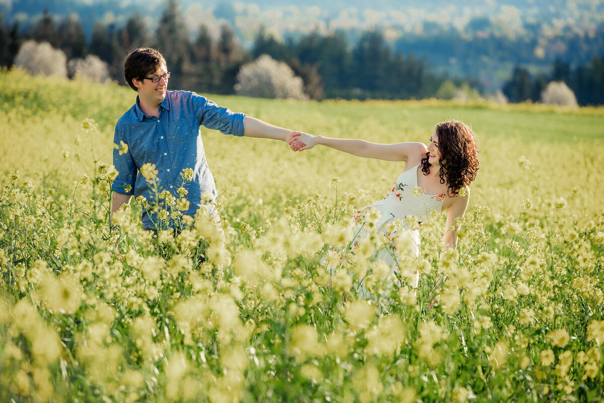 engaged couple in yellow flowers