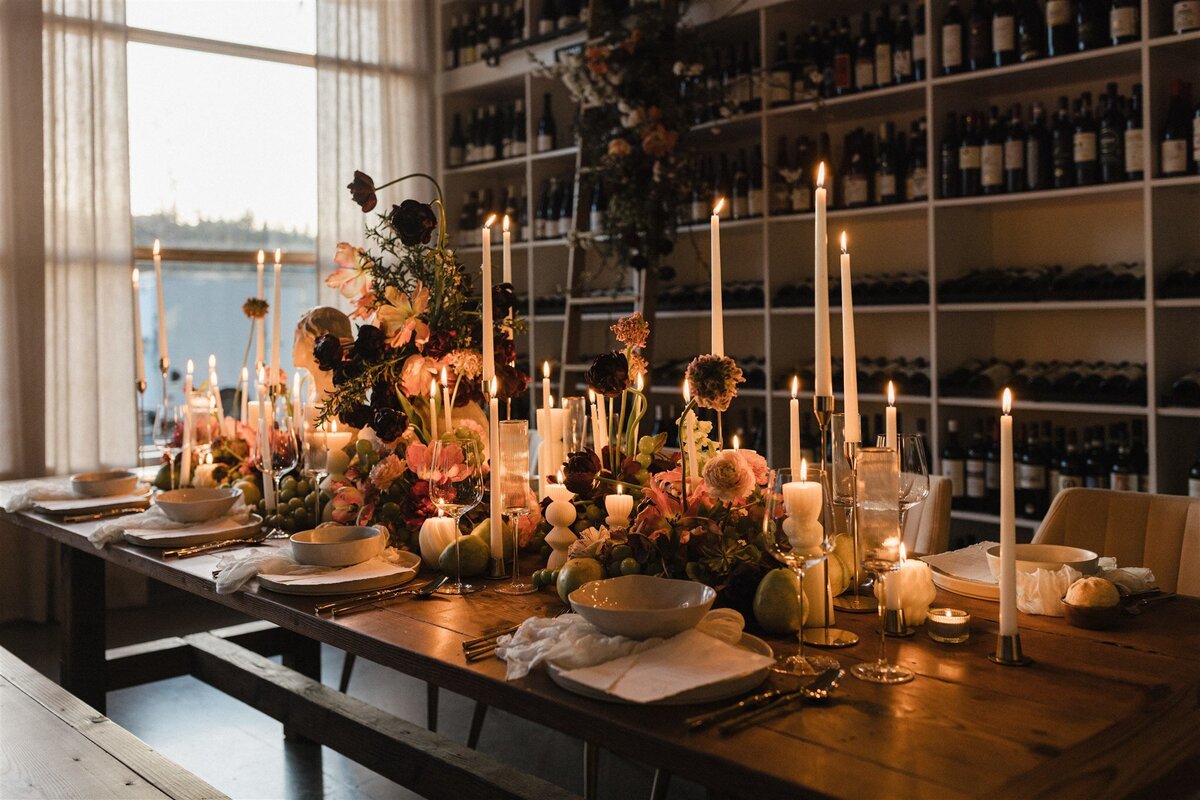 Modern baroque wedding table with sculpture, candles, and hellebore