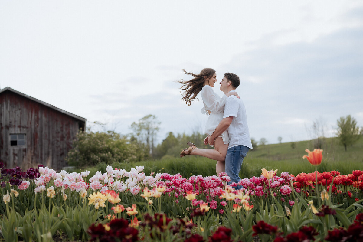Engagement photo shot at a flower farm. Shot by Sanaa Studio - Toronto Wedding Photographer 