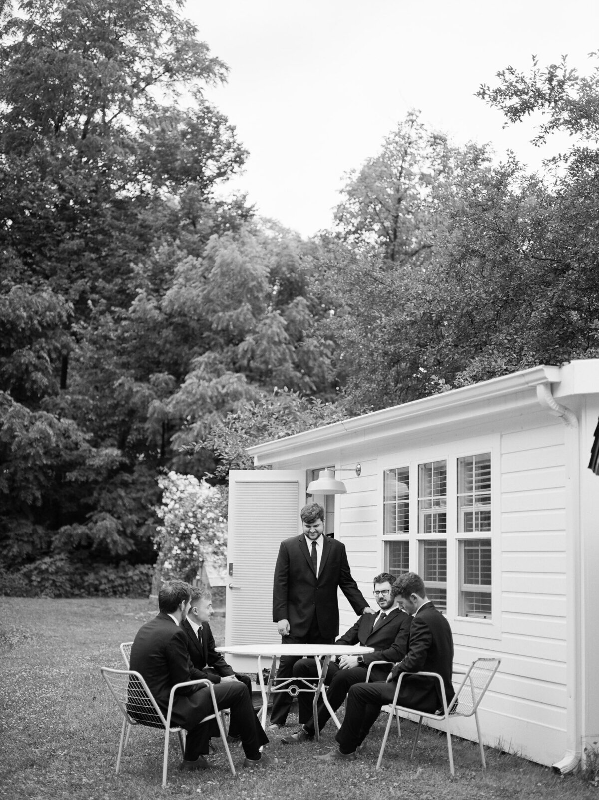 Candid wedding photographer in Michigan, documentary film wedding photography west Michigan, candid groomsmen photo