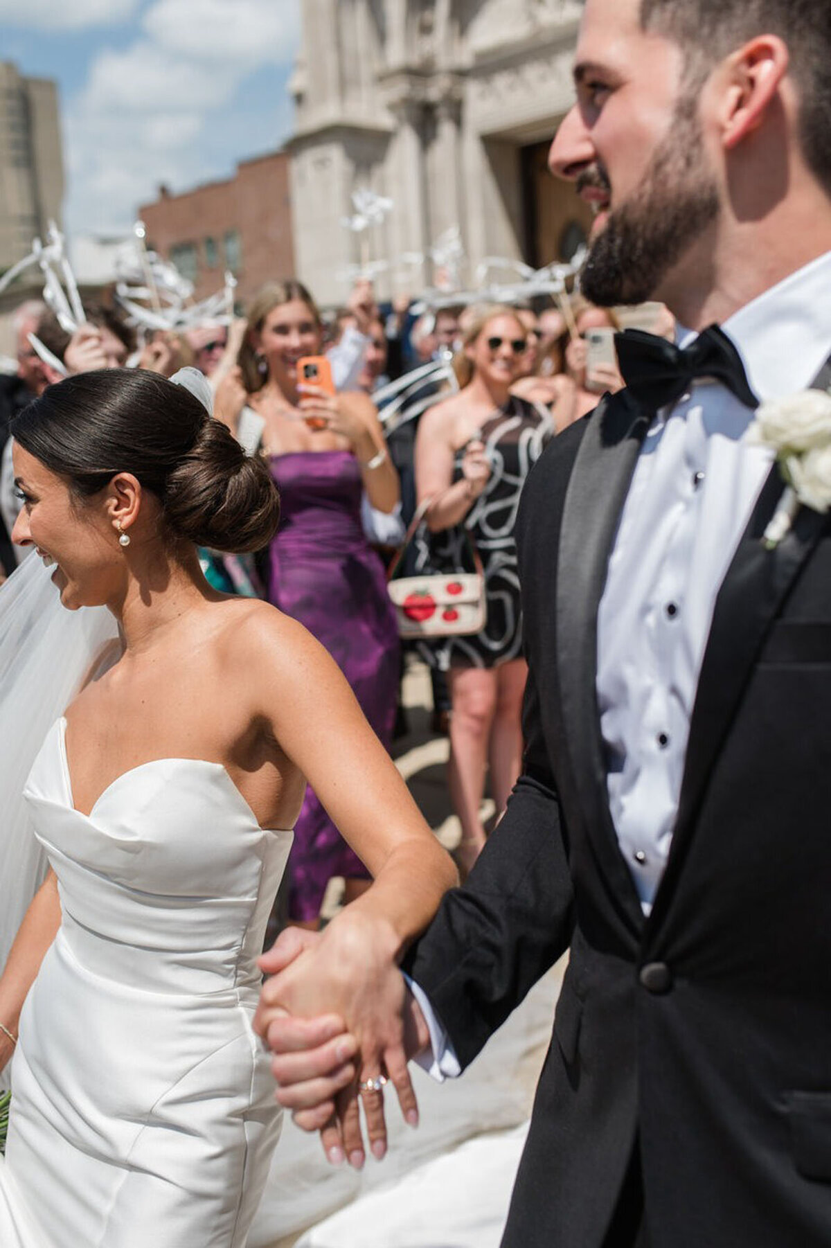 detroit michigan wedding photography of bride and groom walking and holding hands