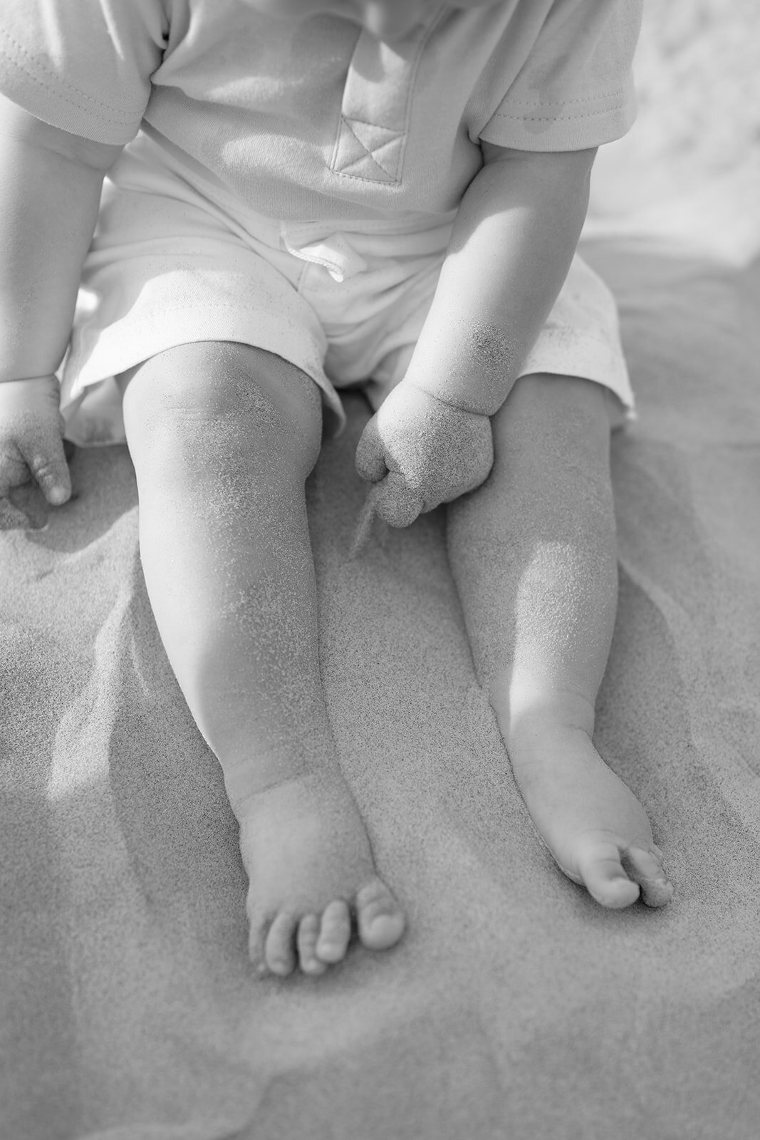 A baby in the sand on the beach in Avalon, NJ