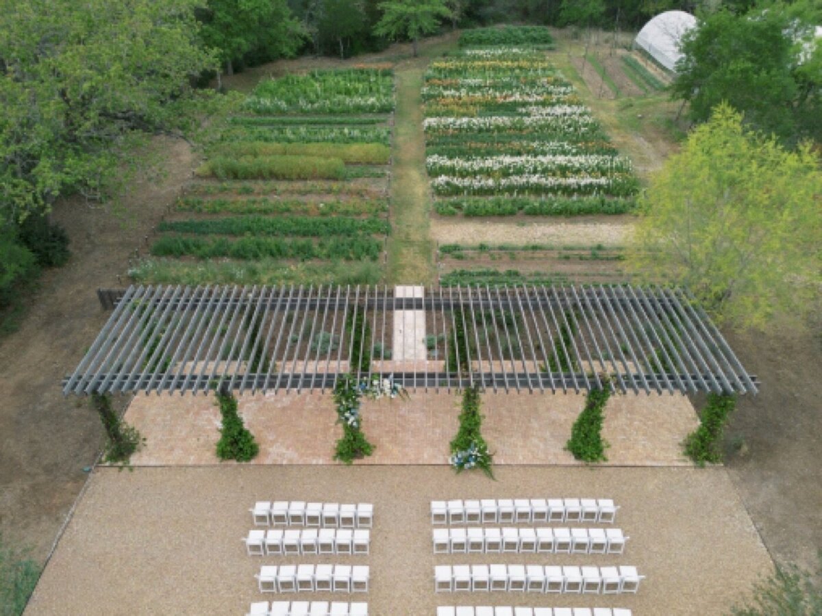 Drone view of the 60-foot pergola and flower farm beds